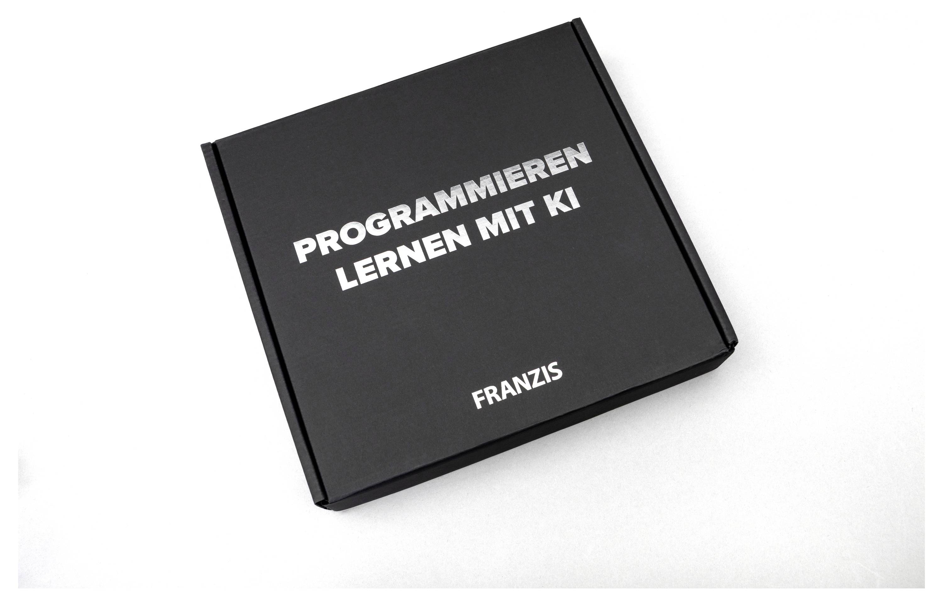 Černá krabice s textem „PROGRAMMIEREN LERNEN MIT KI" a „FRANZIS" v bílé barvě, což naznačuje vzdělávací sadu související s programováním umělé inteligence.