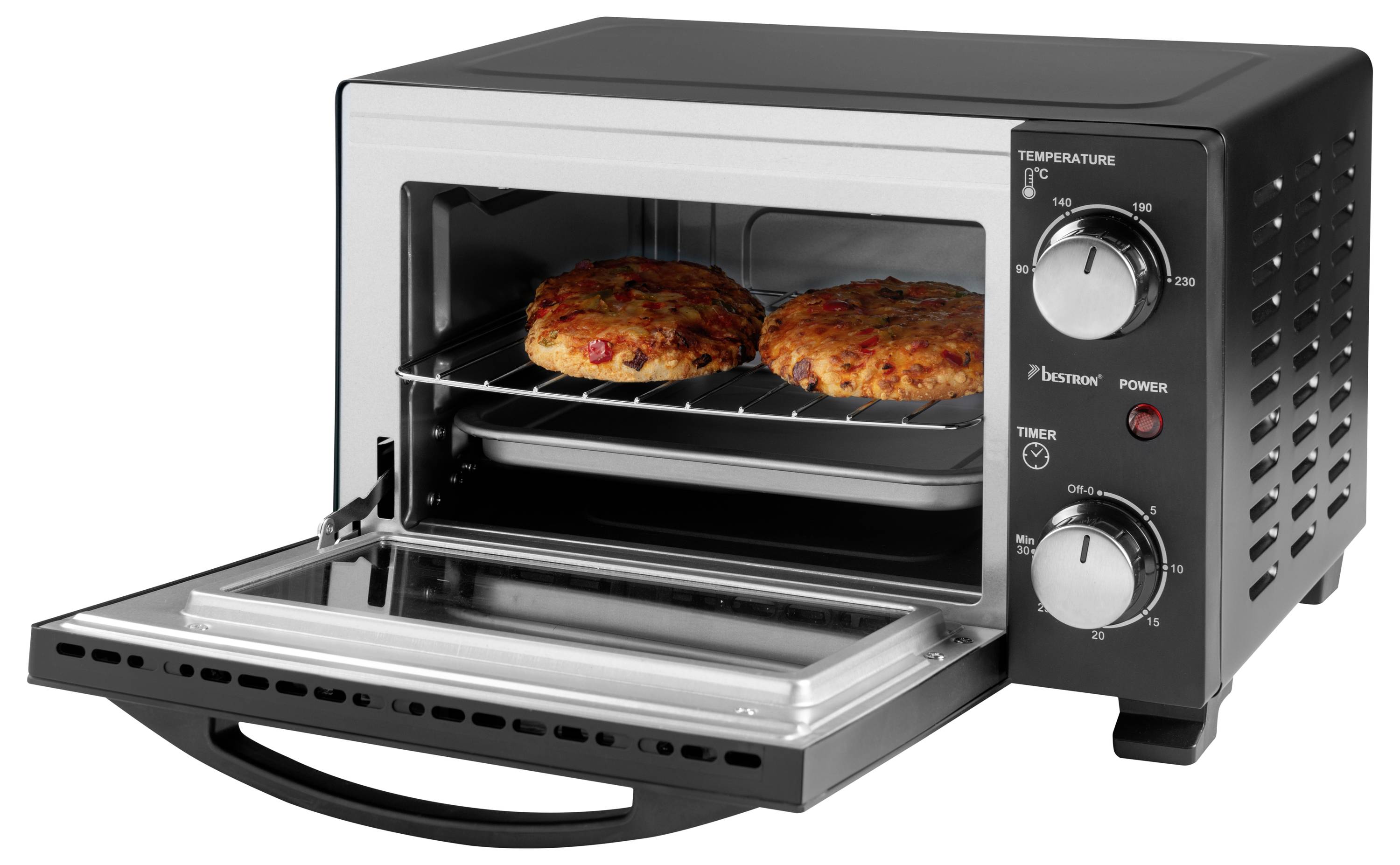 Dvě pizzy se pekou v černé topinkovací troubě s číselníky teploty a času na pravé straně.