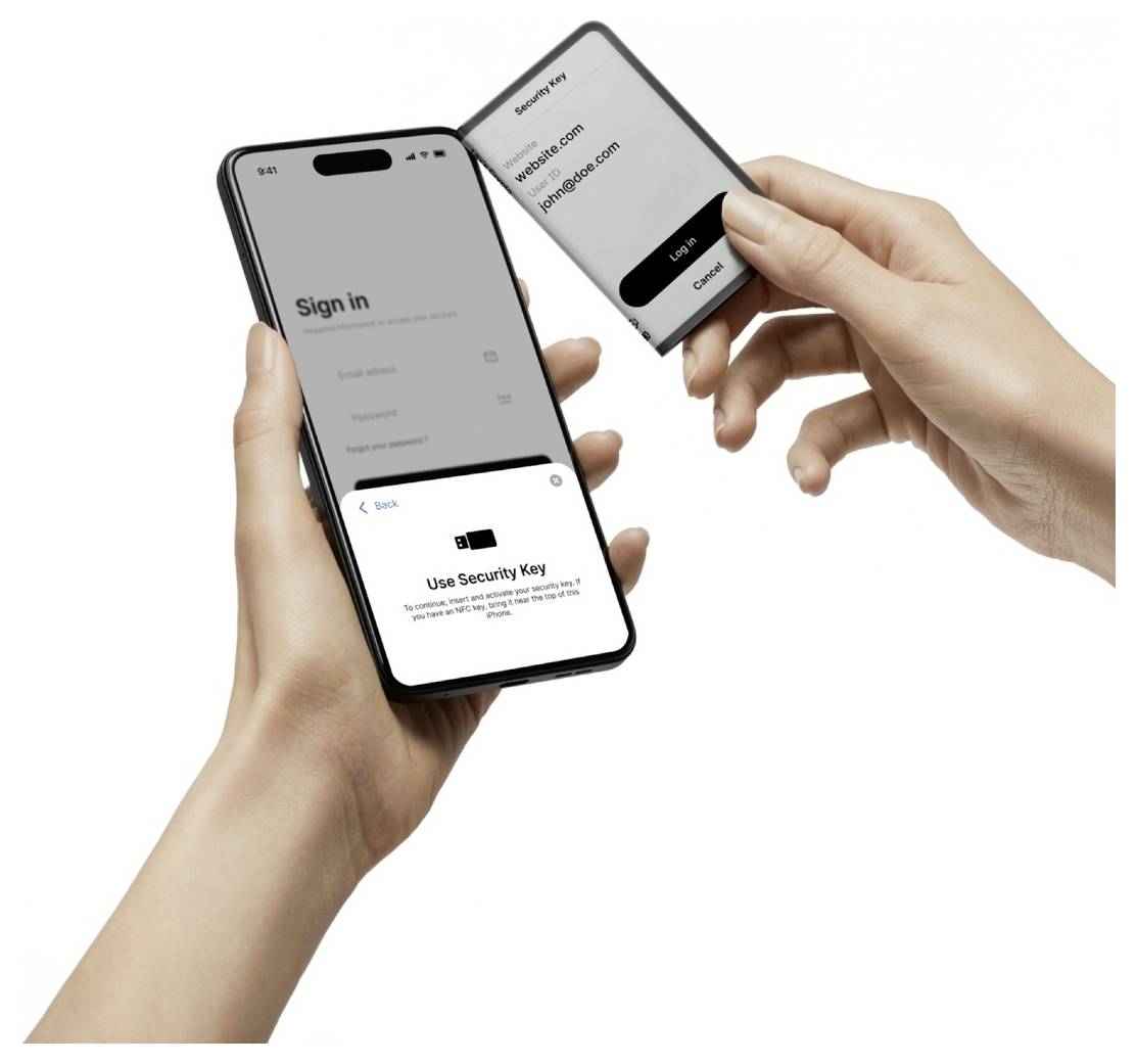 Osoba se přihlašuje prostřednictvím mobilního telefonu s použitím bezpečnostního klíče, což demonstruje bezpečné ověřování.