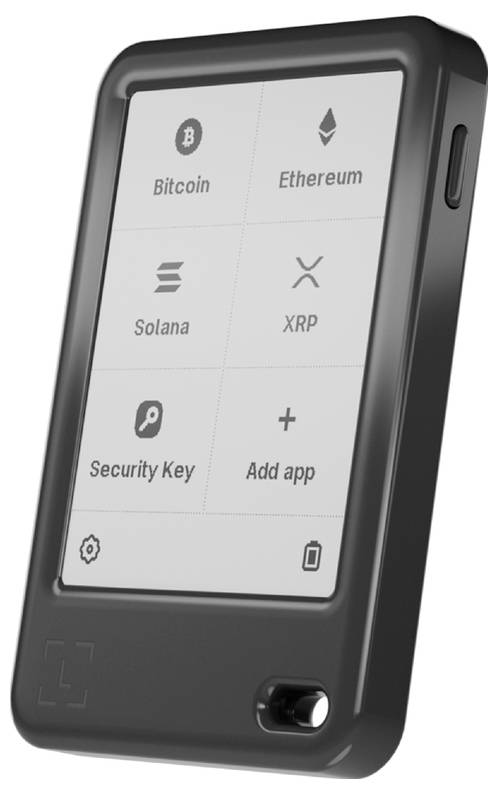 Hardwarová peněženka na kryptoměny zobrazující možnosti pro 'Bitcoin', 'Ethereum', 'Solana', 'XRP', 'Bezpečnostní klíč' a 'Přidat aplikaci'.