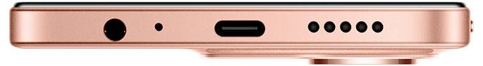 Boční pohled na chytrý telefon zobrazující růžové kovové pouzdro, 3,5mm zdířku pro sluchátka, USB-C port, reproduktory a mírně vyčnívající fotoaparát.