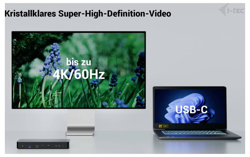 Monitor a notebook spojené přes dokovací stanici. Monitor zobrazuje „bis zu 4K/60Hz". Notebook ukazuje „USB-C".