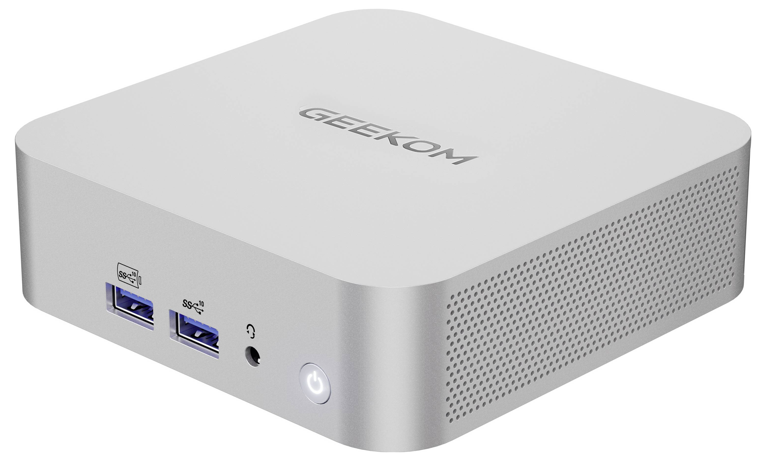 Kompaktní GEEKOM mini PC se dvěma porty USB-A, jack pro sluchátka a předním tlačítkem napájení na stříbrné skříni.