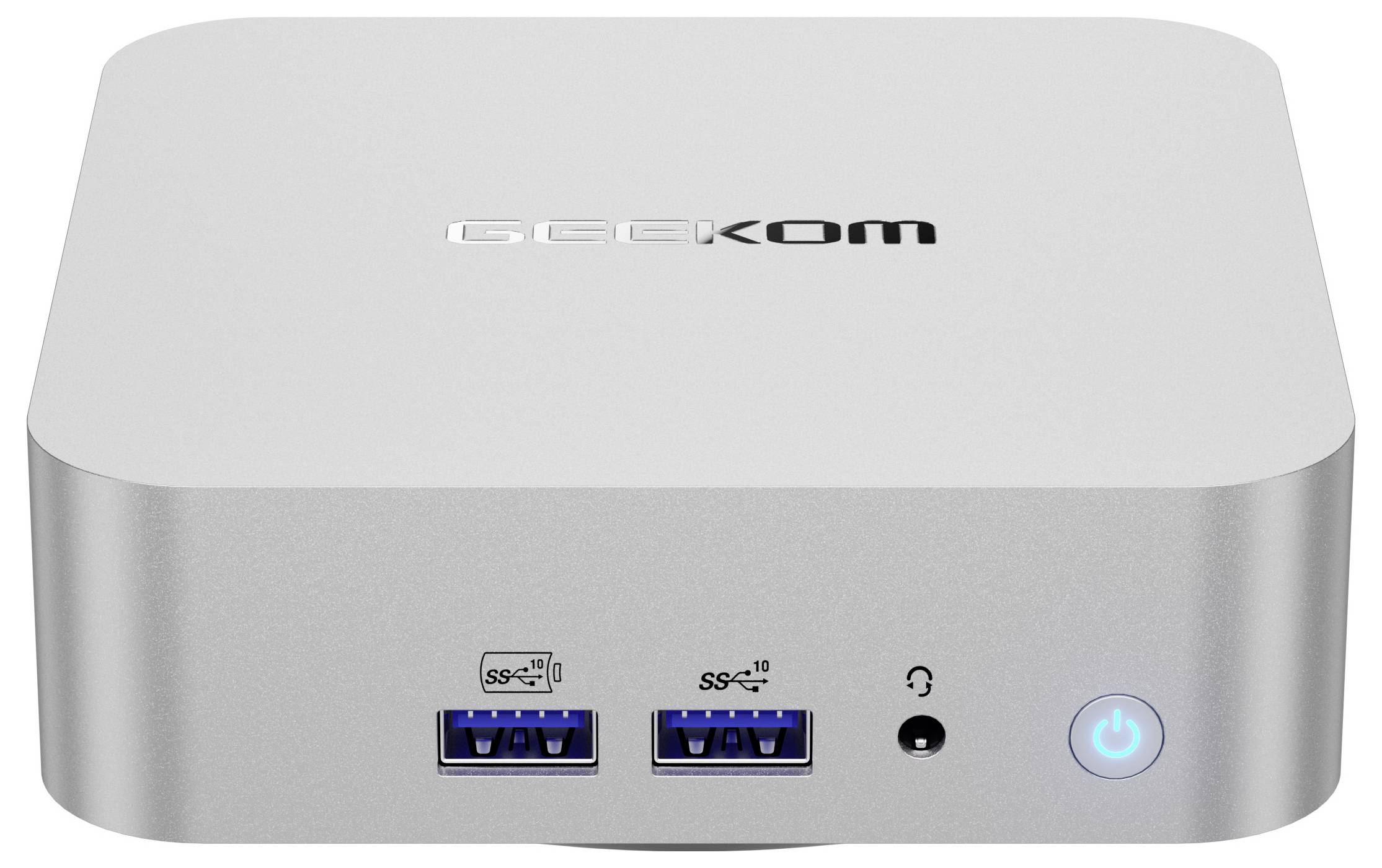 Kompaktní Geekom mini PC s předními porty USB, konektorem pro sluchátka a svítícím tlačítkem napájení.