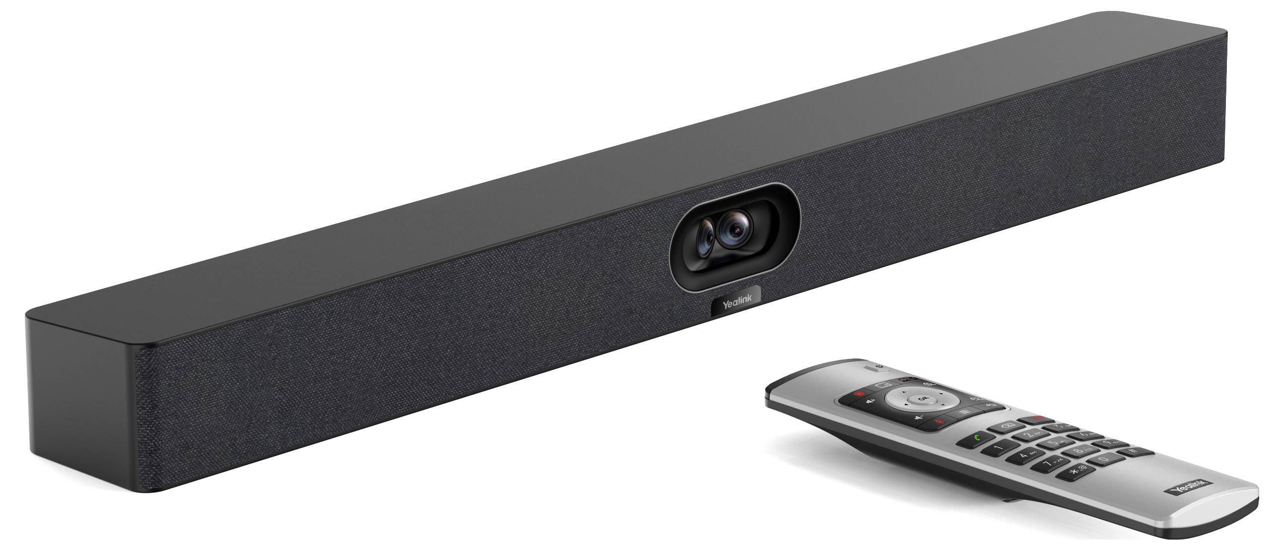Černý obdélníkový soundbar s centrální reproduktorovou mřížkou. Vedle něj je umístěn stříbrný dálkový ovladač.