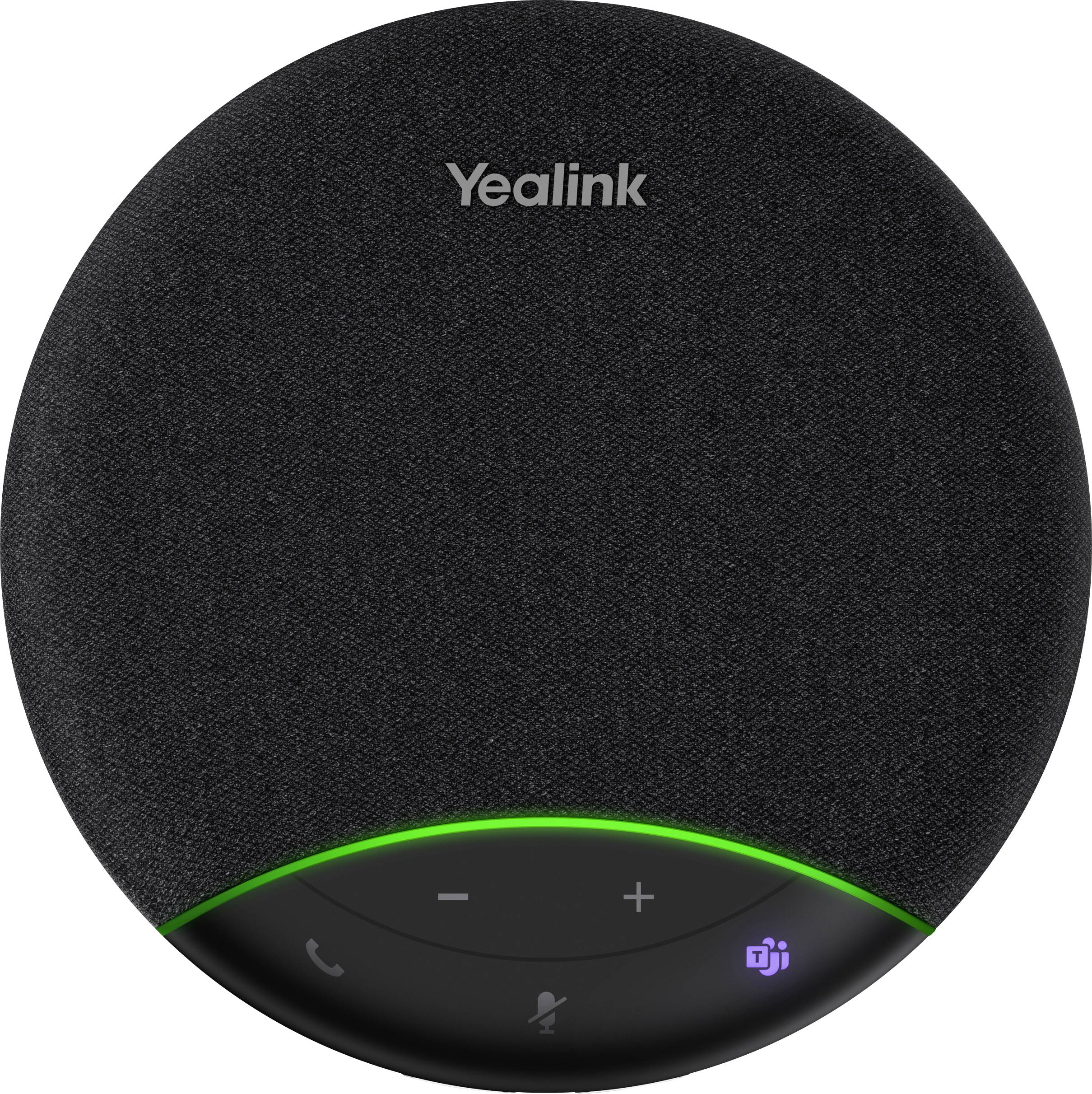 Černý kulatý hlasitý telefon se značkou „Yealink", zelenou LED diodou a dotykovými ovládacími prvky pro hlasitost, mikrofon a funkce volání.
