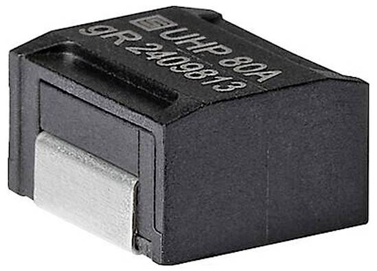 Černá elektronická součástka označená "UHP 80A 9R 2409813", pravděpodobně pojistka nebo ochranný prvek obvodu, s kovový konektorem.
