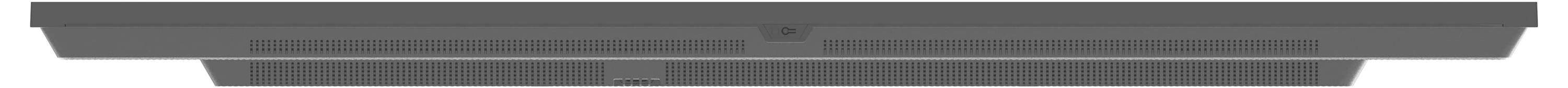 Pohled zblízka na tmavě barevný soundbar, který vystavuje jeho reproduktorovou mřížku a elegantní design.