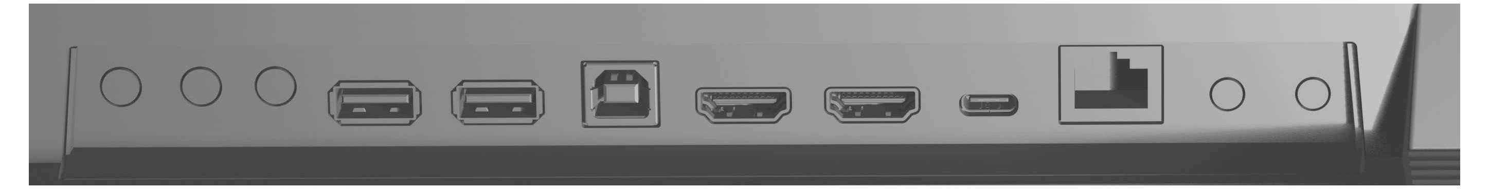 Zadní panel zařízení s různými porty: dva porty USB, dva porty HDMI, jeden port Ethernet a jeden port napájecího vstupu.