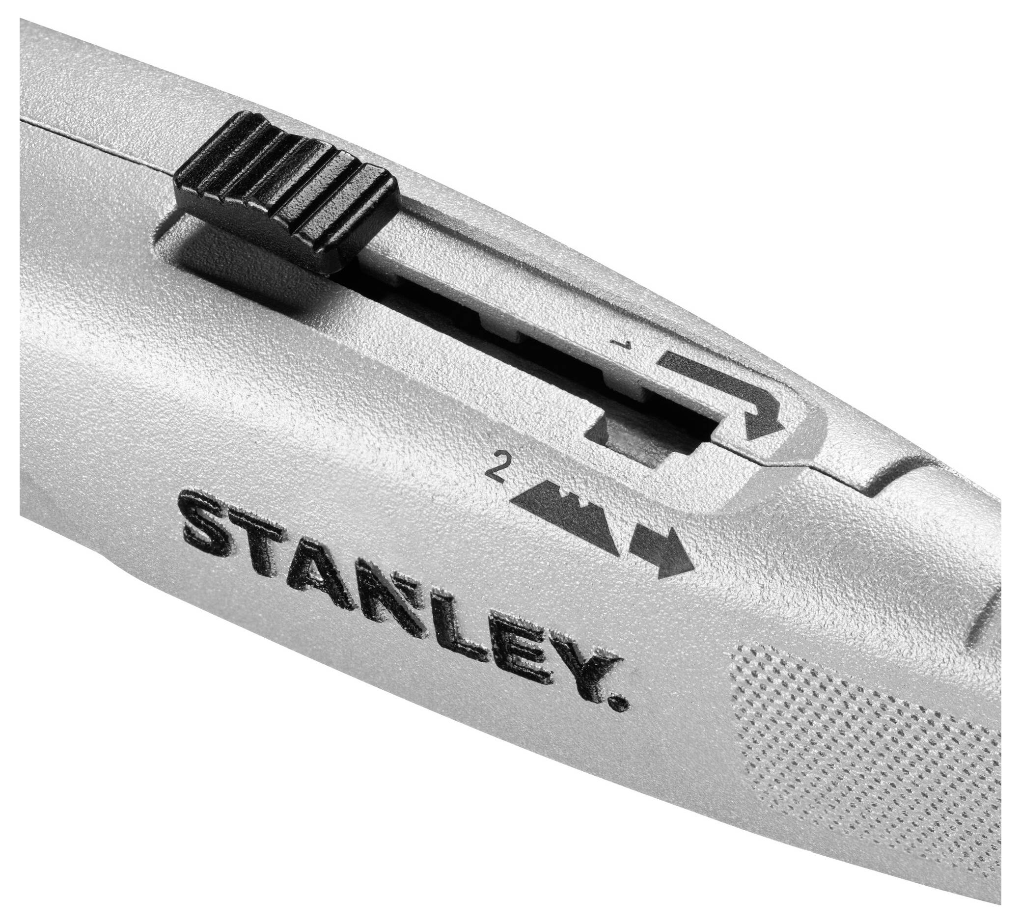 Mechanismus nastavení čepele na užitkovém nožu se zaobleným posuvníkem, označený horskou ikonou a nápisem "Stanley" na rukojetí.