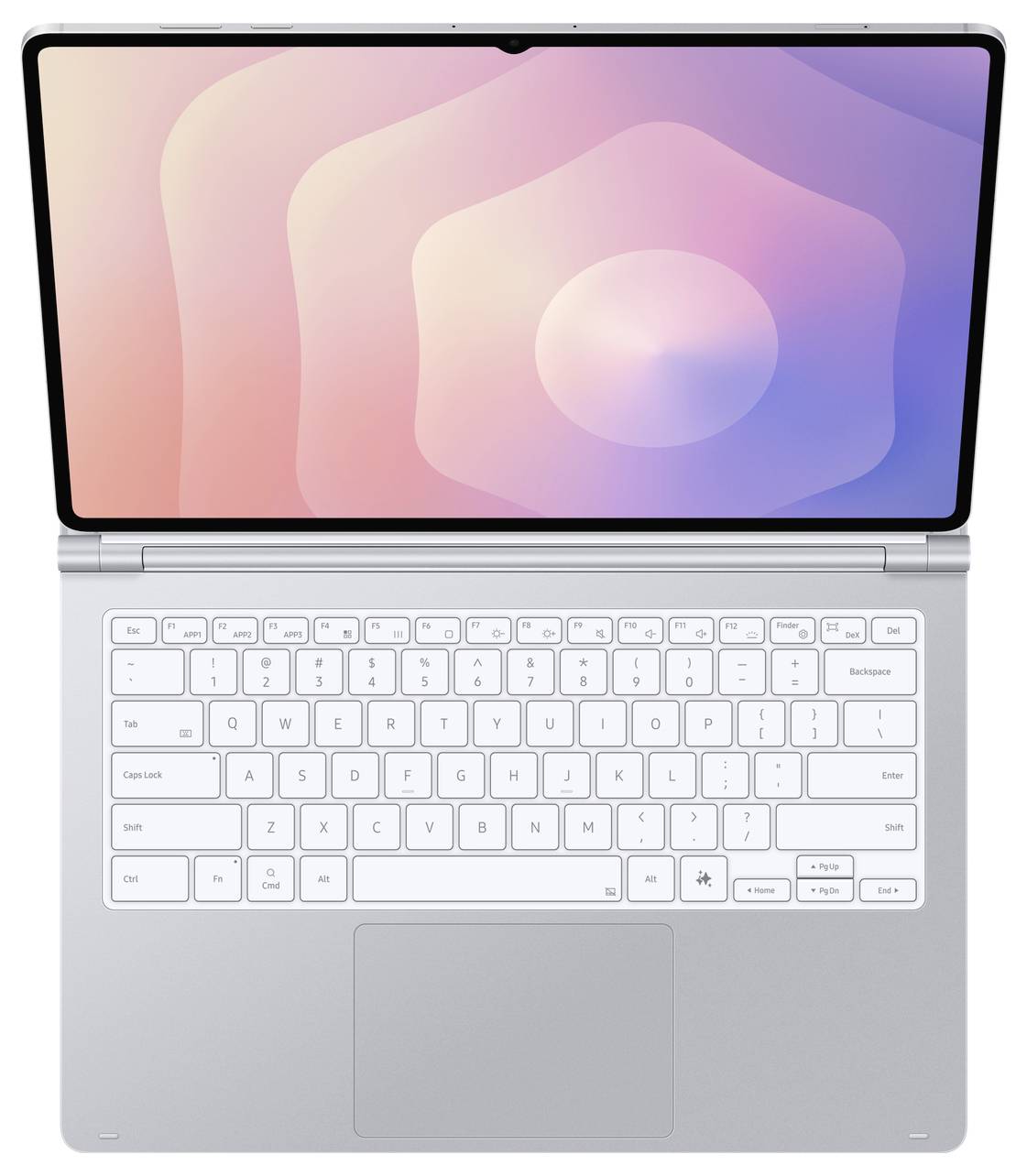 Otevřený laptop s jemnou abstraktní tapetou na obrazovce a bílou klávesnicí, fotografovaný ze shora.