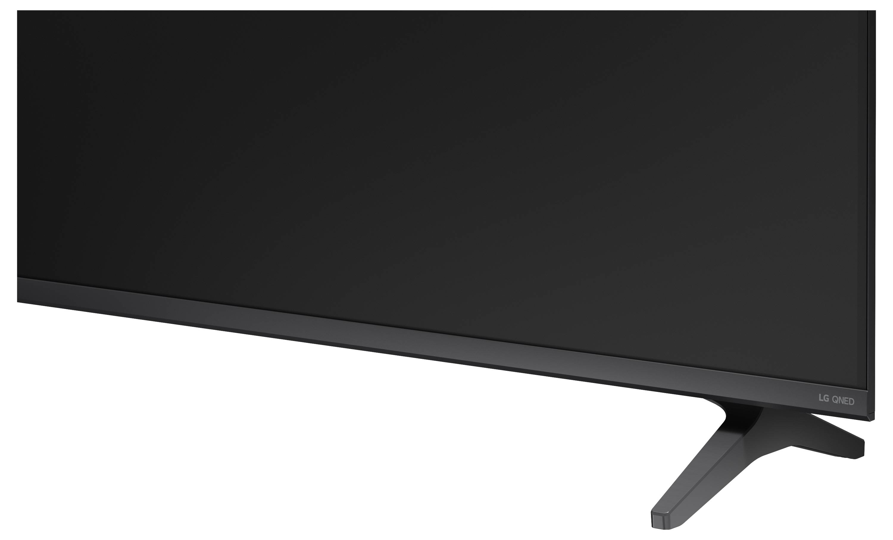 Velký plochý OLED televizor LG zobrazený v úhlu se štíhlým černým rámečkem a V-tvarným stojánem na bílém pozadí.