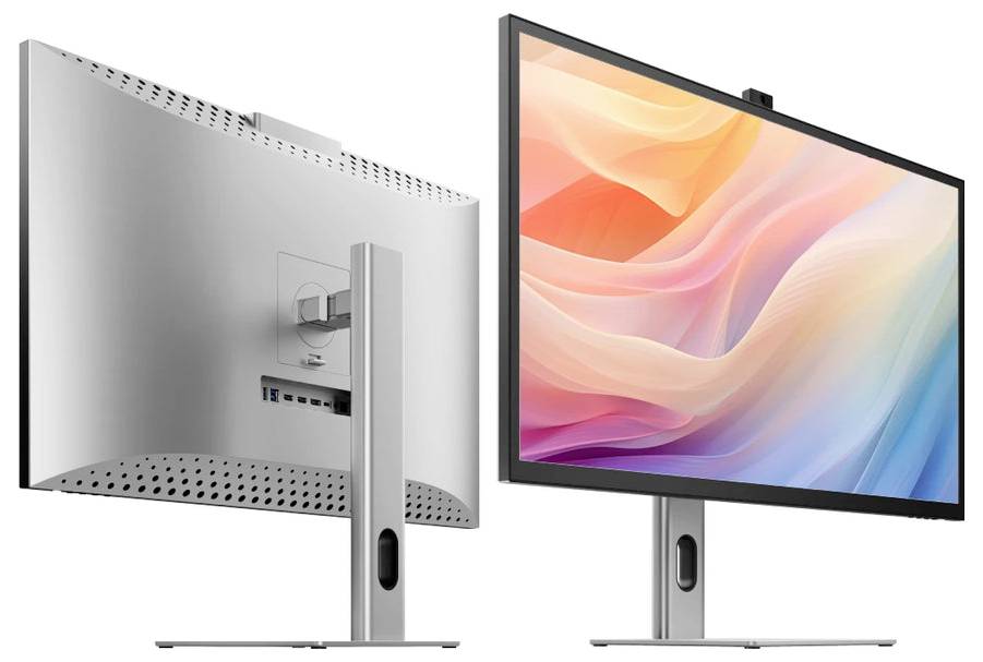 Boční a přední pohled na stříbrný stolní monitor na stojanu, ukazující obrazovku a zadní porty.