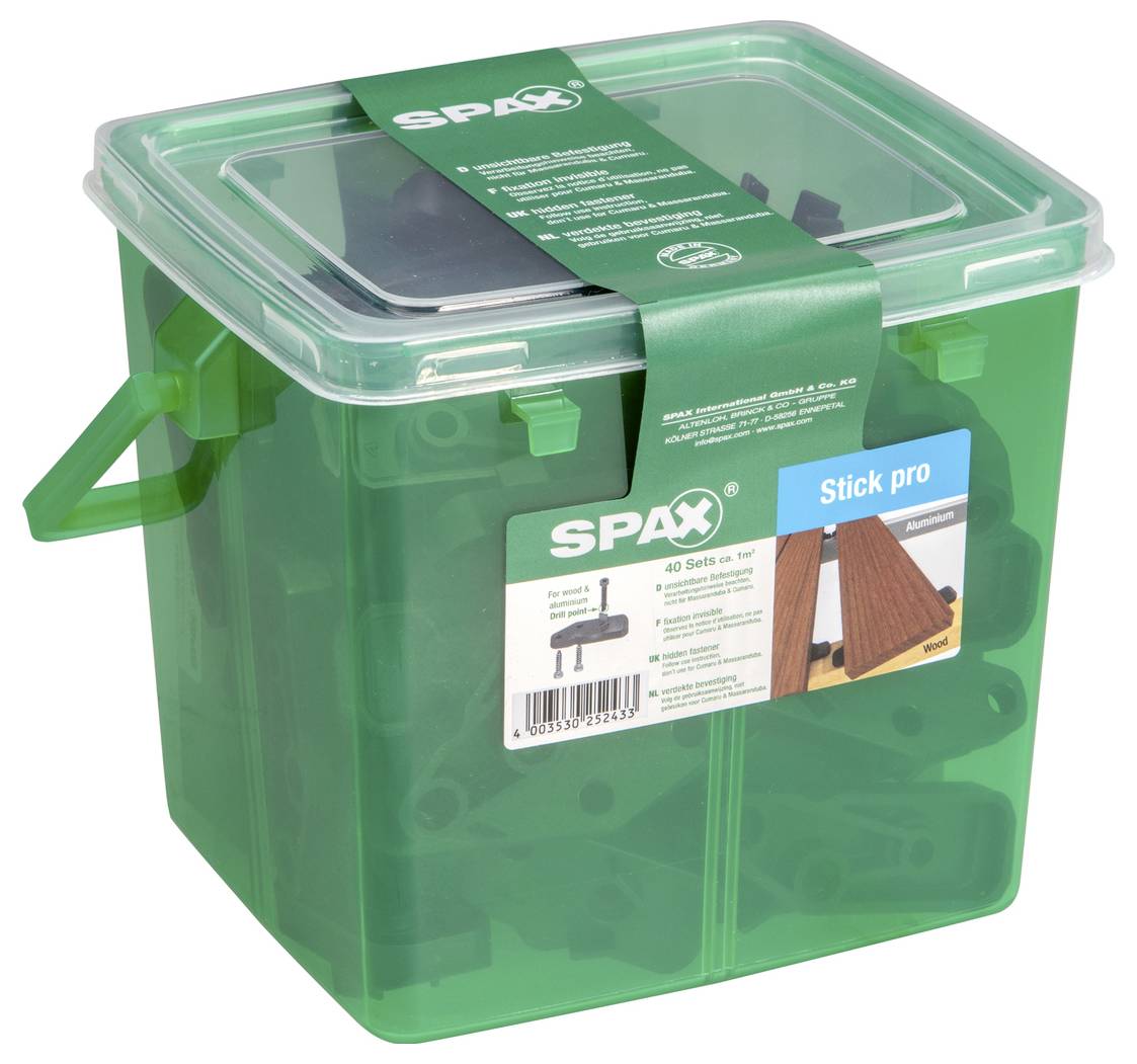 Zelená průhledná plastová krabice na skladování s průsvitným víkem a rukojetí, označená SPAX Stick pro, zobrazující organizovaný obsah spojovacího materiálu uvnitř.