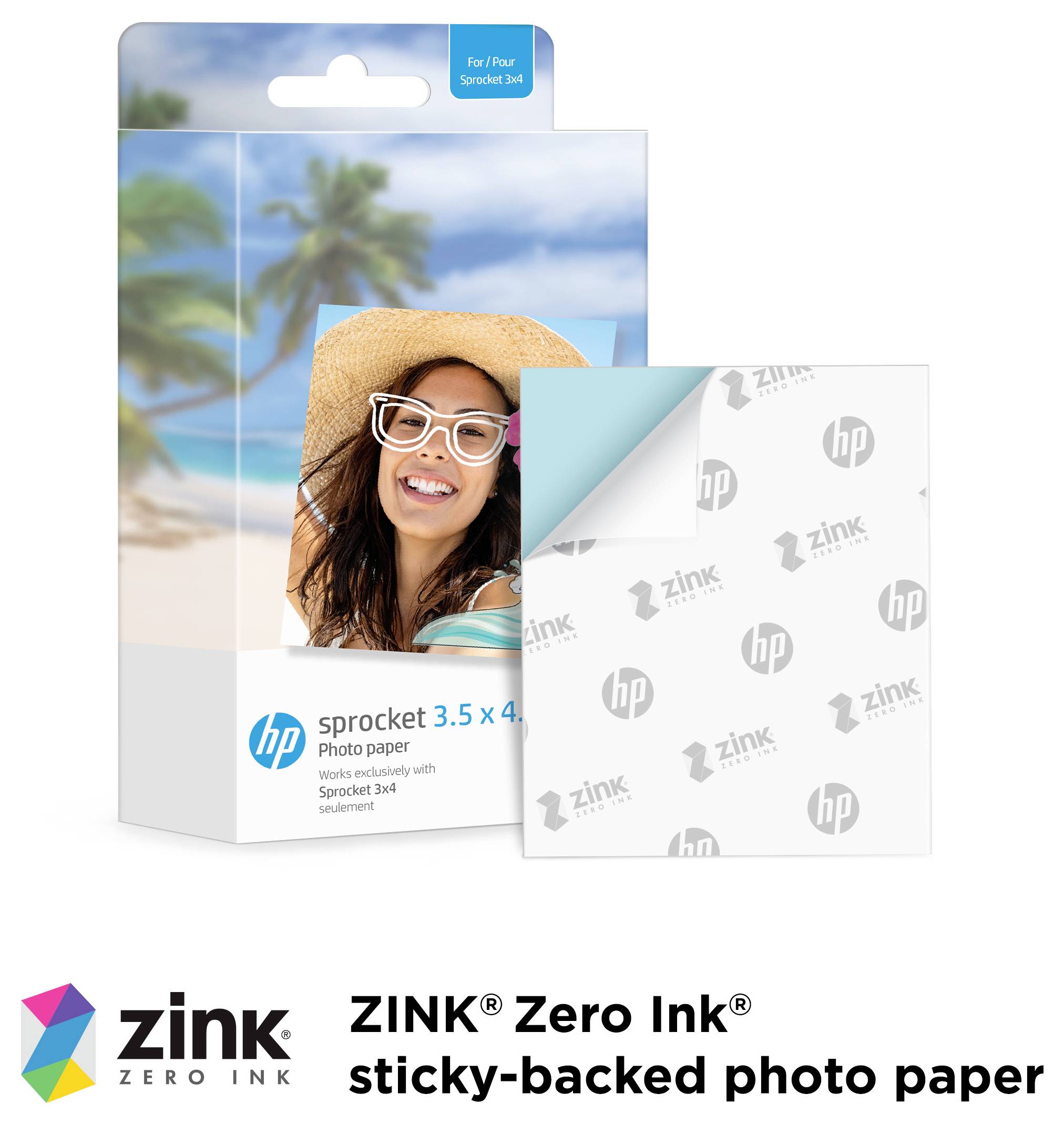 Balíček papíru na fotografie HP ZINK Zero Ink s lepící vrstvou s vzorovým plážovým fotoaparátem a samostatným lepicím fotolističem vpředu.