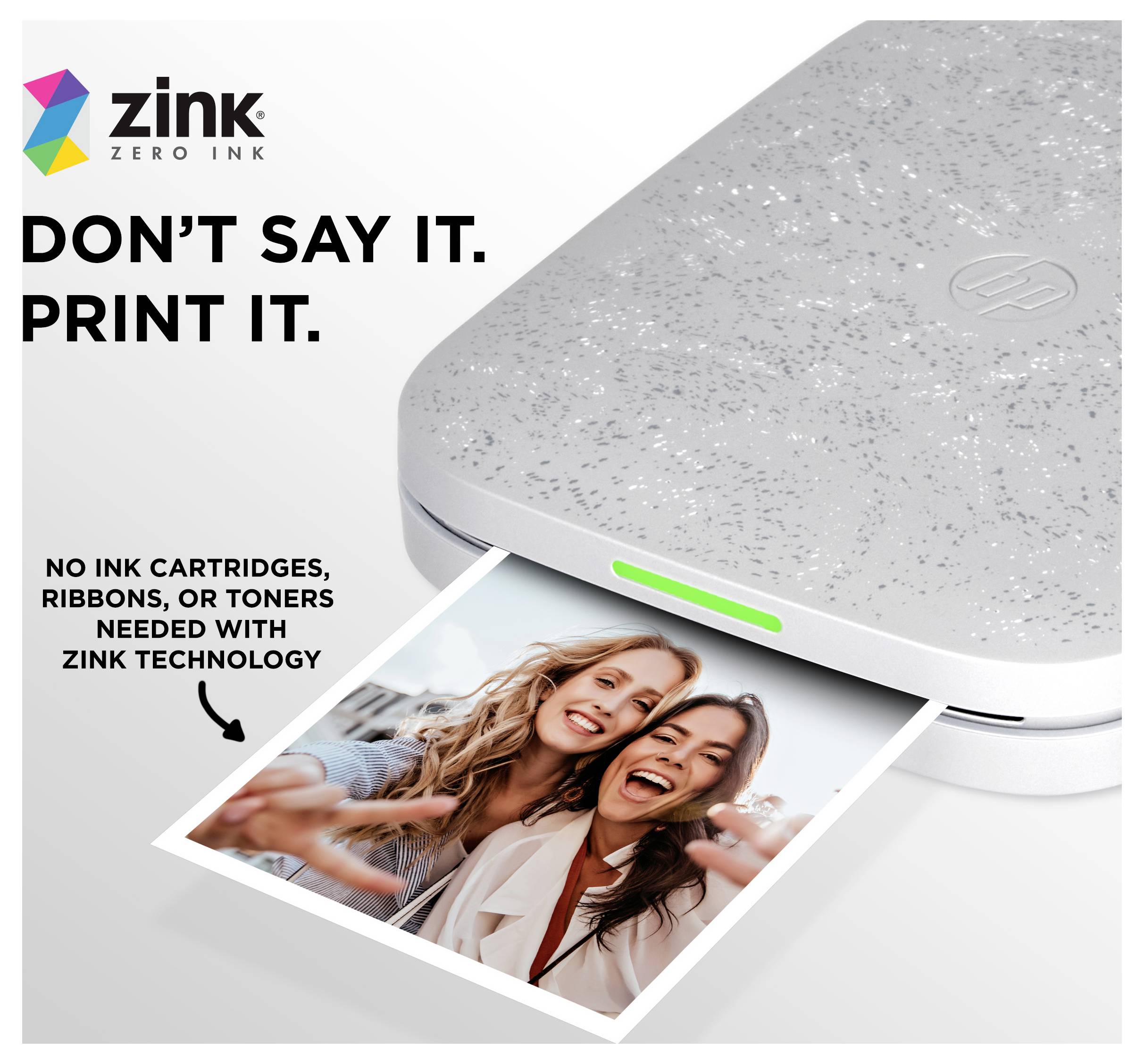 Tiskárna Zink Zero Ink tiskne fotografii se sloganem "NEŘÍKEJ TO. VYTISKNI TO." a textem uvádějícím, že nejsou potřebné inkoustové kazety, pásky nebo tonery.
