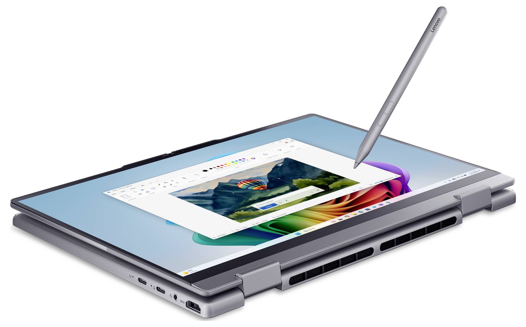 Konvertibilní přenosný počítač tablet se stylisem vznášejícím se nad dotykovým displejem, zobrazující aplikaci pro digitální tvorbu umění/úpravu fotografií