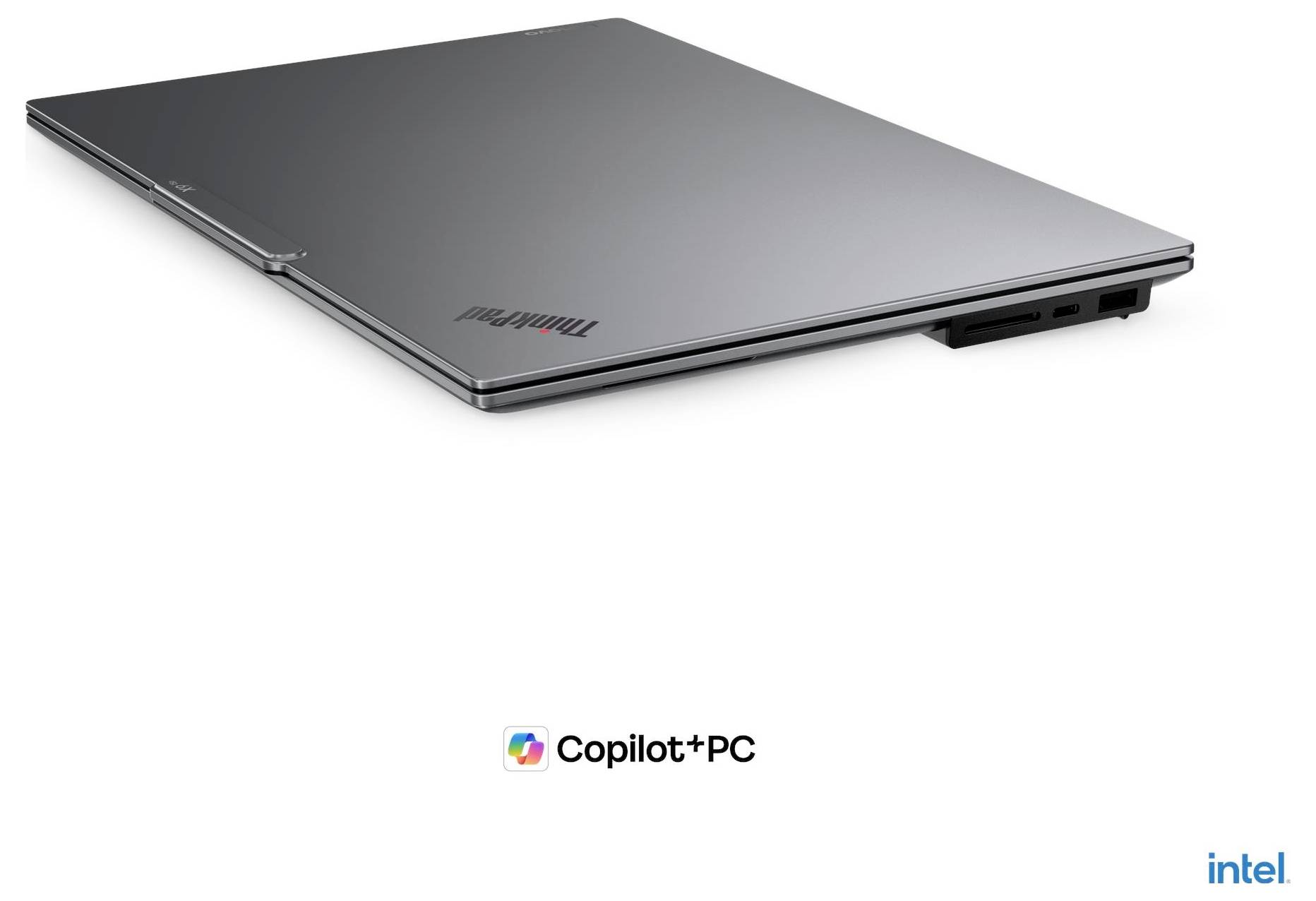 Stříbrný laptop Lenovo ThinkPad zobrazený zavřený na bílém pozadí s označením "Copilot+PC" a značkou Intel níže.
