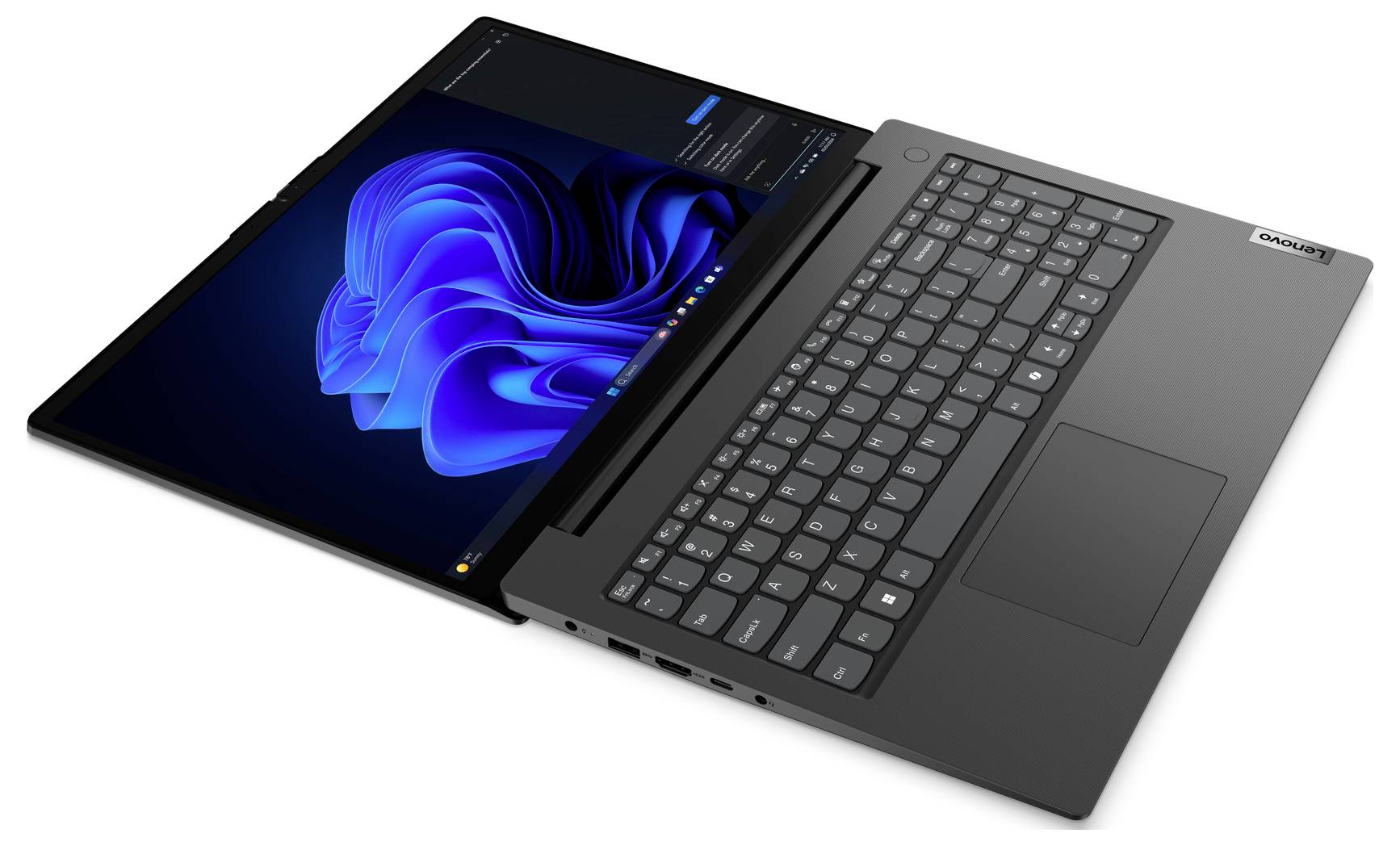 Otevřený laptop s tmavě šedou klávesnicí a modrou abstraktní tapetou na obrazovce, zobrazený v úhlu na bílém pozadí.