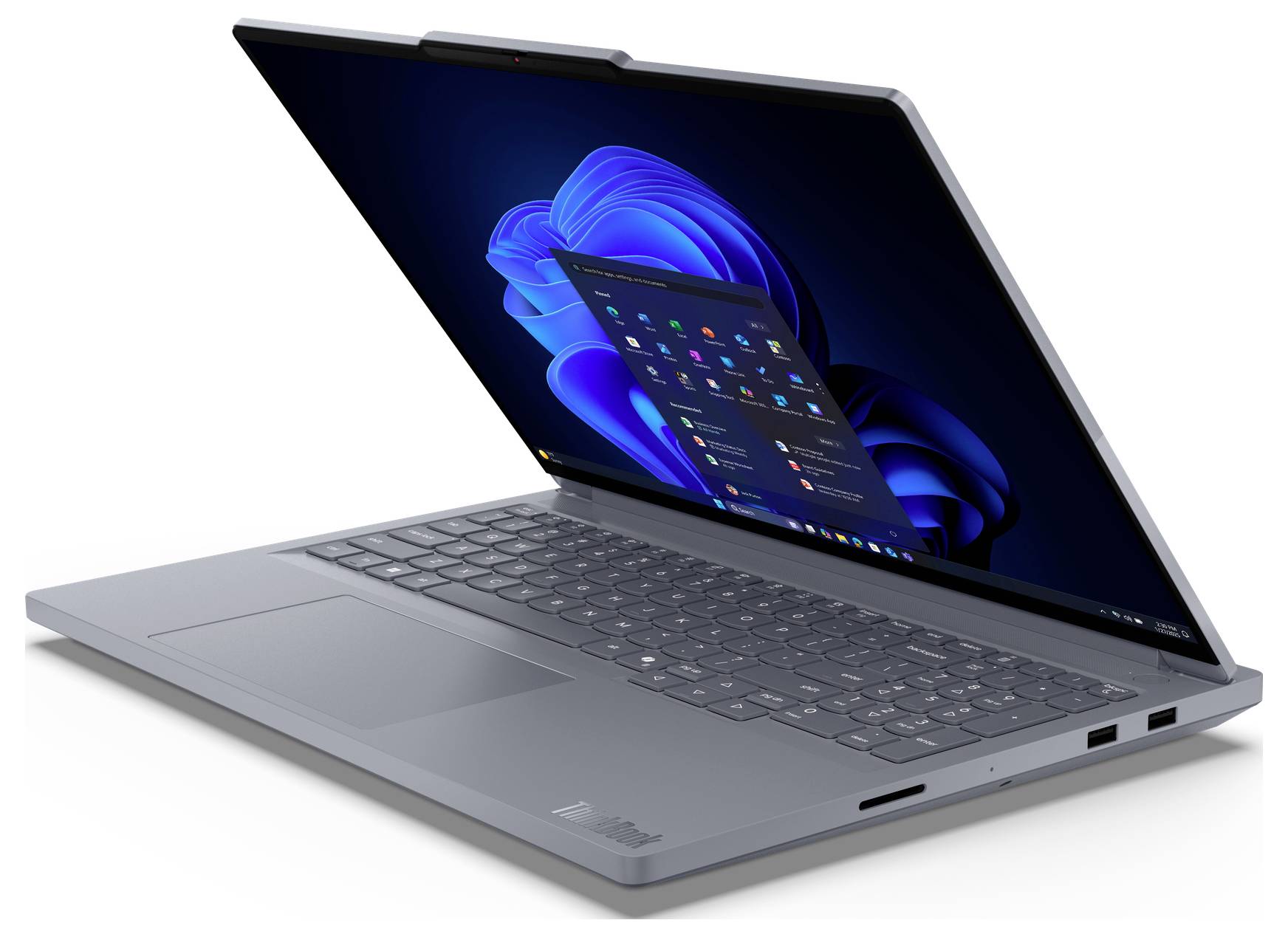 Stříbrný laptop zobrazen částečně otevřený v režimu podobném tabletu, zobrazující plochu ve stylu Windows 11 na bílém pozadí.