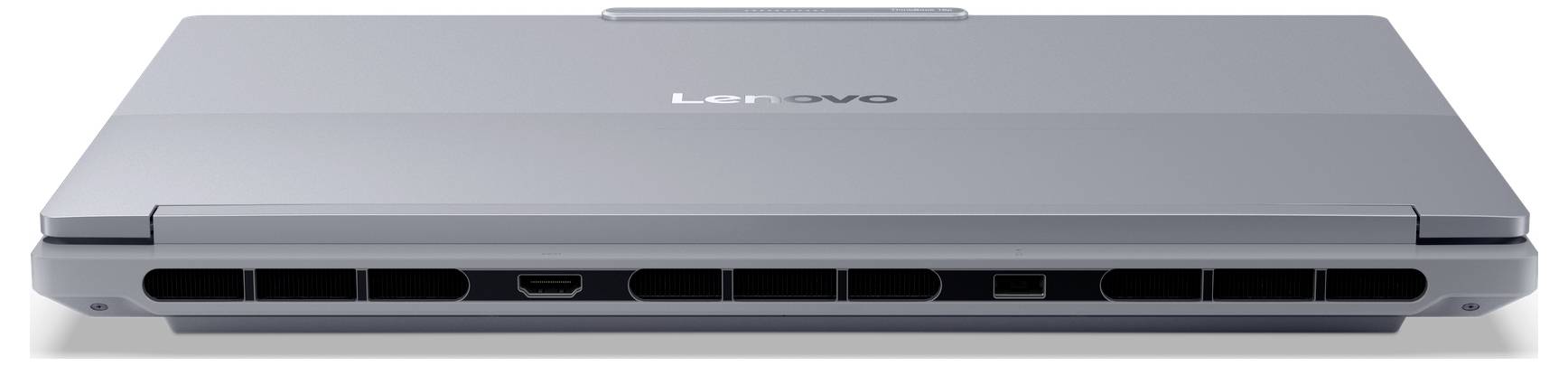 Zavřený stříbrný notebook Lenovo zobrazený zepředu, zdůrazňující tenký profil a centrované logo Lenovo.