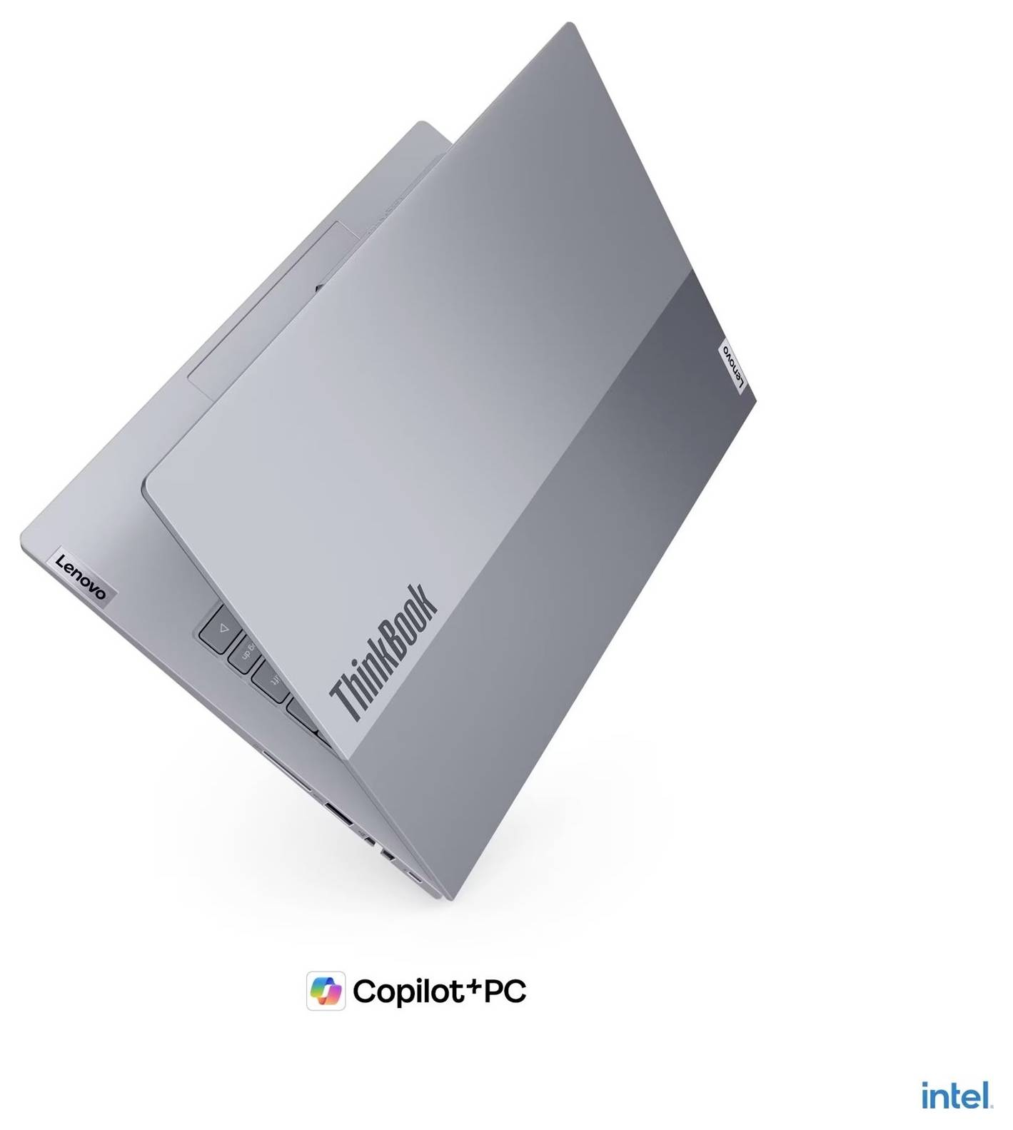 Stříbrný laptop Lenovo ThinkBook zobrazený zavřený v úhlu s logem "Copilot+ PC" a značkou Intel níže.