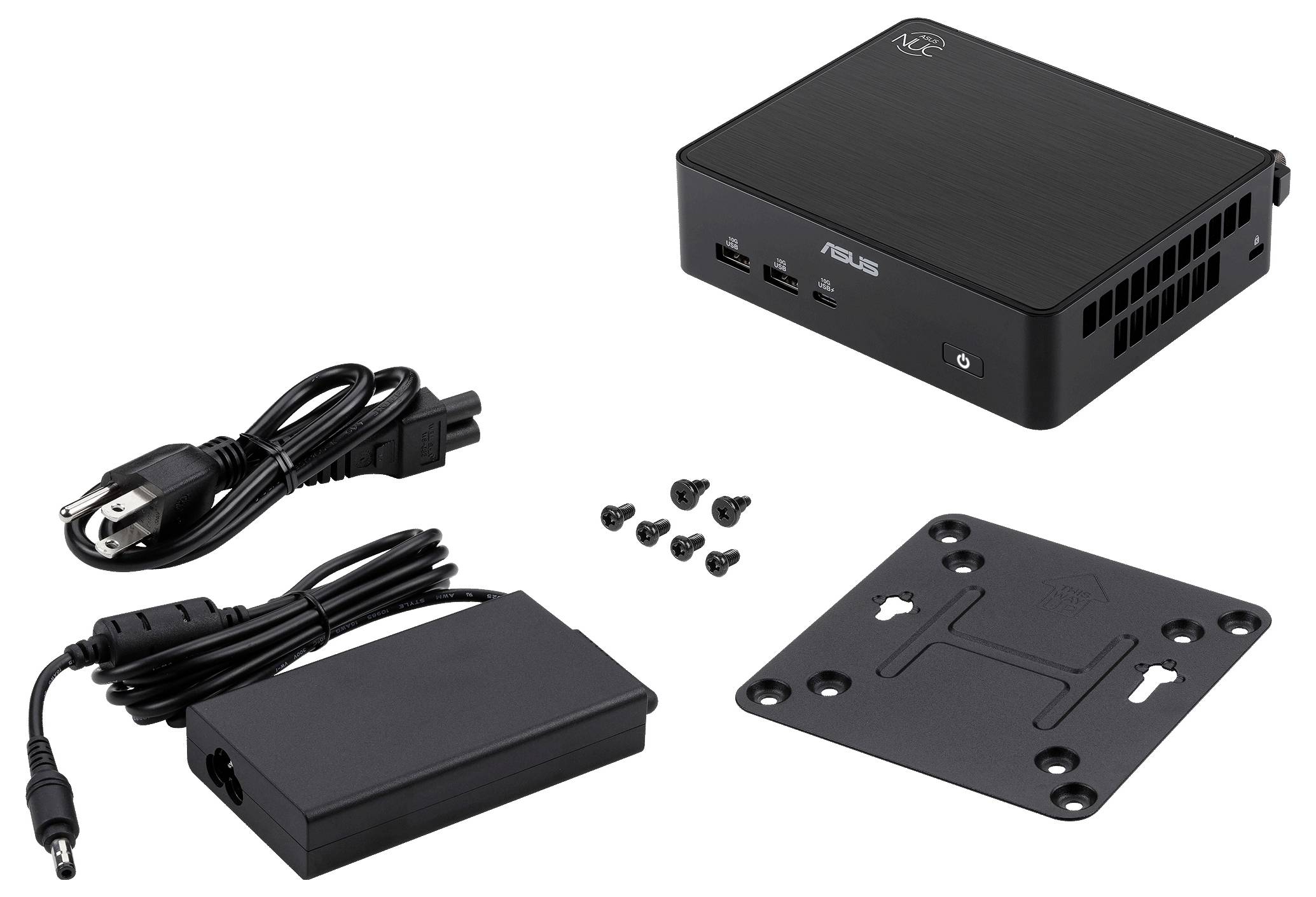 ASUS mini PC zobrazený se síťovým adaptérem, napájecím kabelem, montážní deskou a šrouby obsaženými v balení.