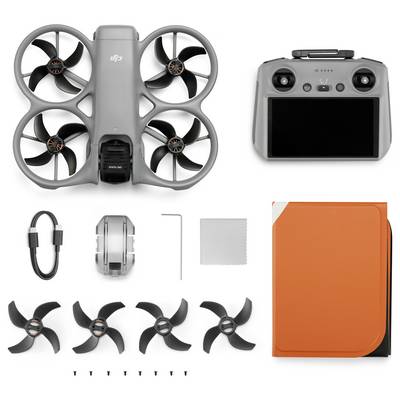 Skládací sada DJI dronu zobrazená s tělem dronu, dálkovým ovladačem, kabelem, náhradními vrtulemi, šrouby, nástrojem a oranžovým přepravním pouzdrem.
