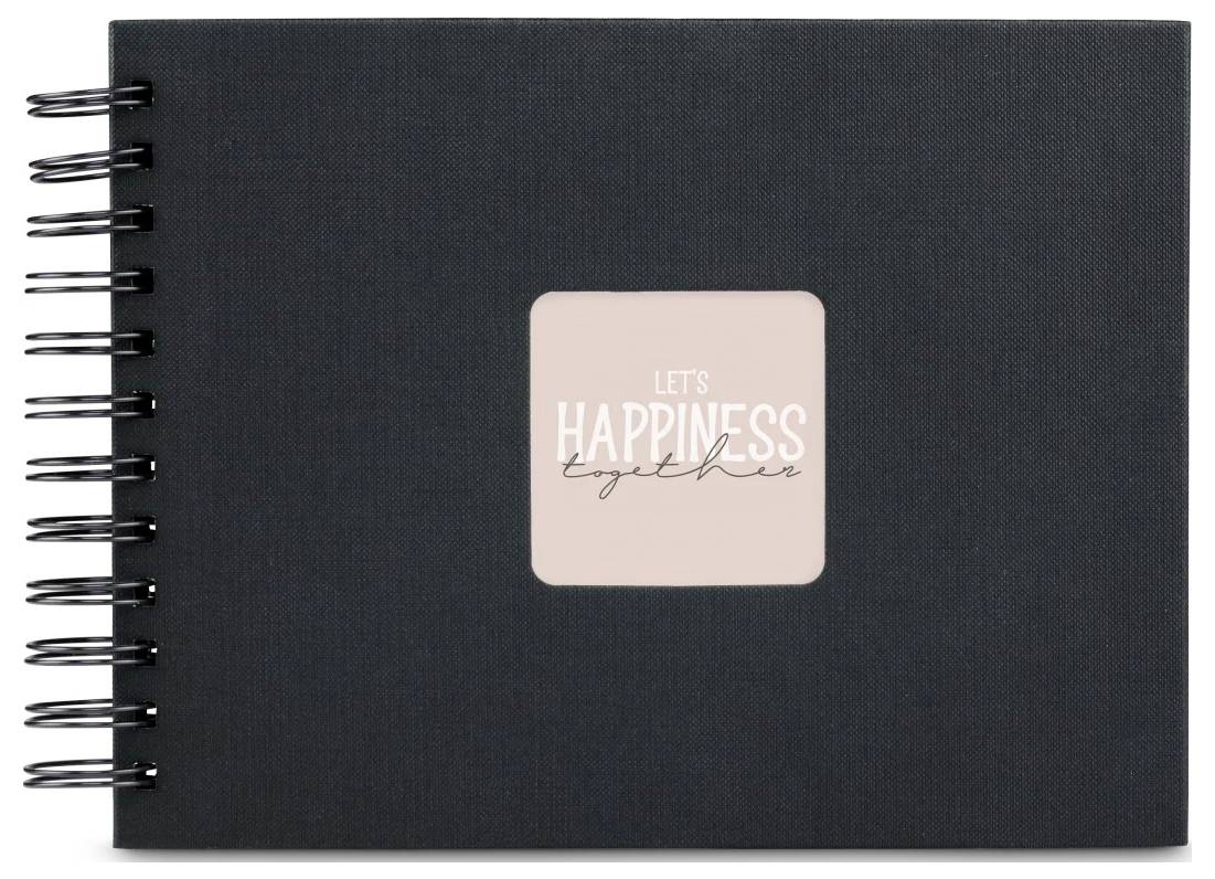 Černý kroužkově vázaný zápisník s růžovým štítkem na obálce s nápisem „LET'S HAPPINESS together".