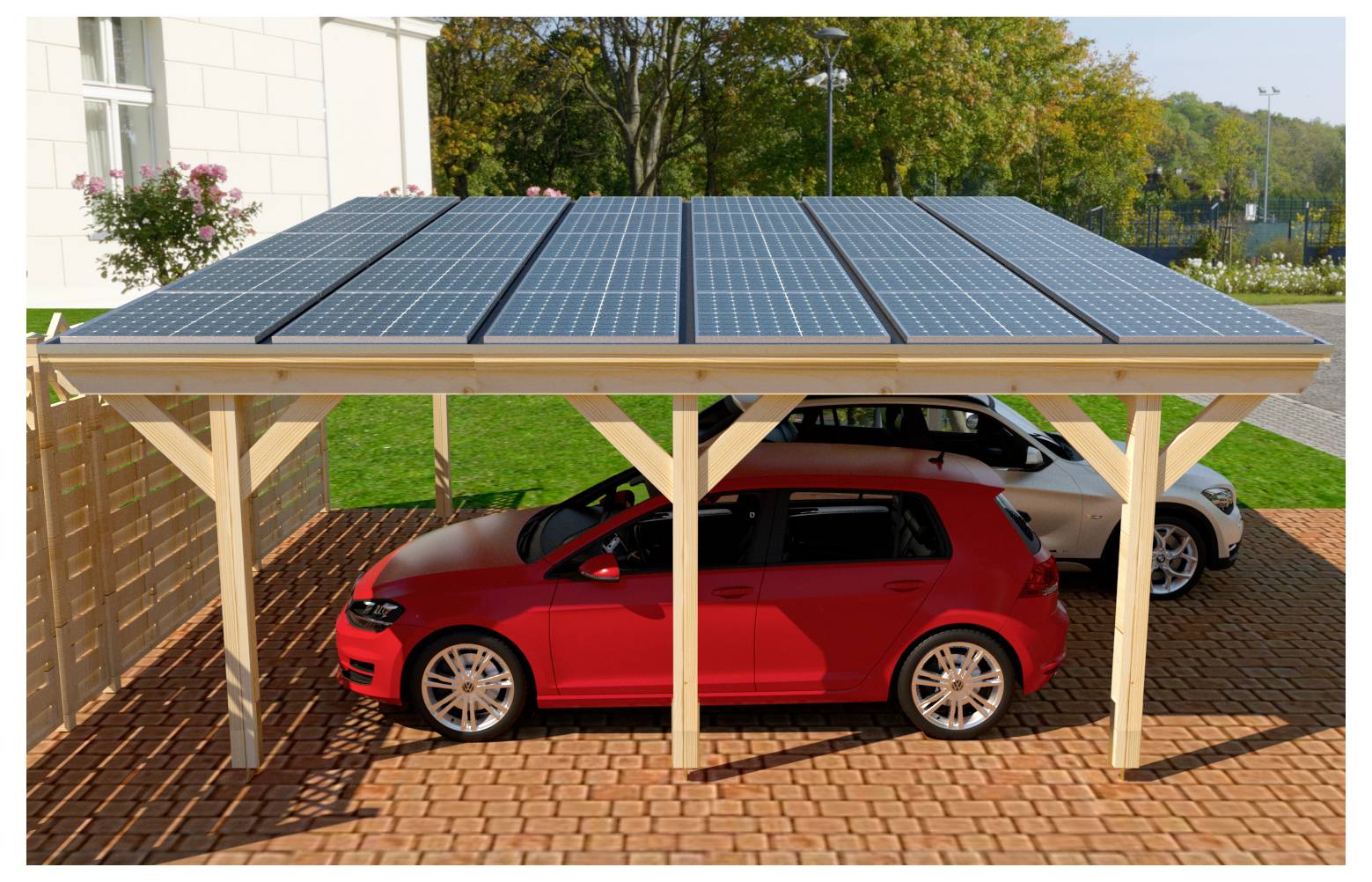 Solární přístřešek s panely na střeše stínící červené hatchbacky a bílý automobil zaparkovaný pod ním.