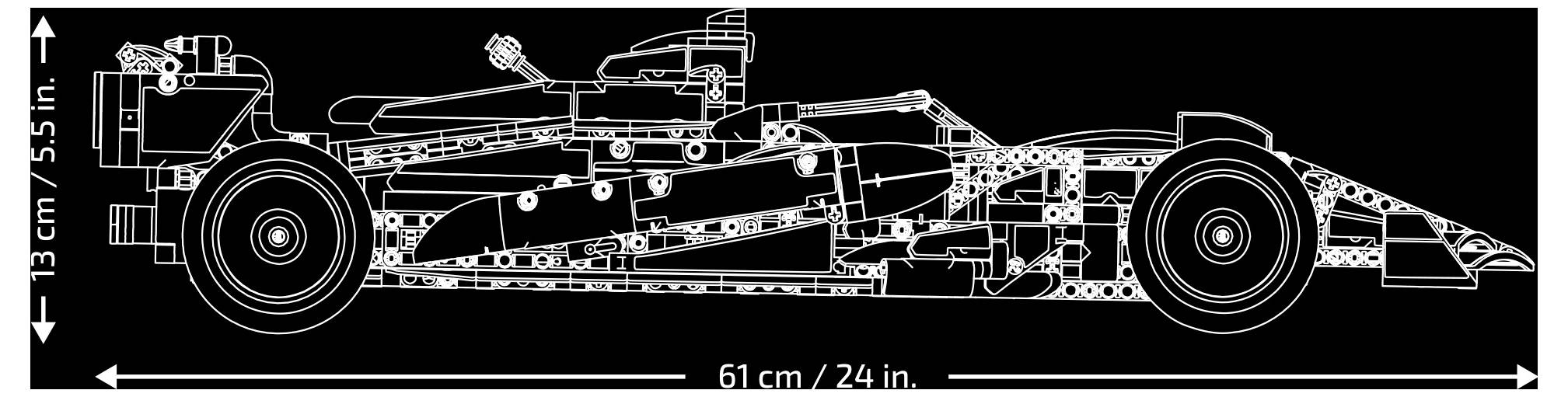 Technický diagram pohledu zezadu nízkoprofilového pojízdného stroje se rozměry: délka 61 cm a výška 13 cm.