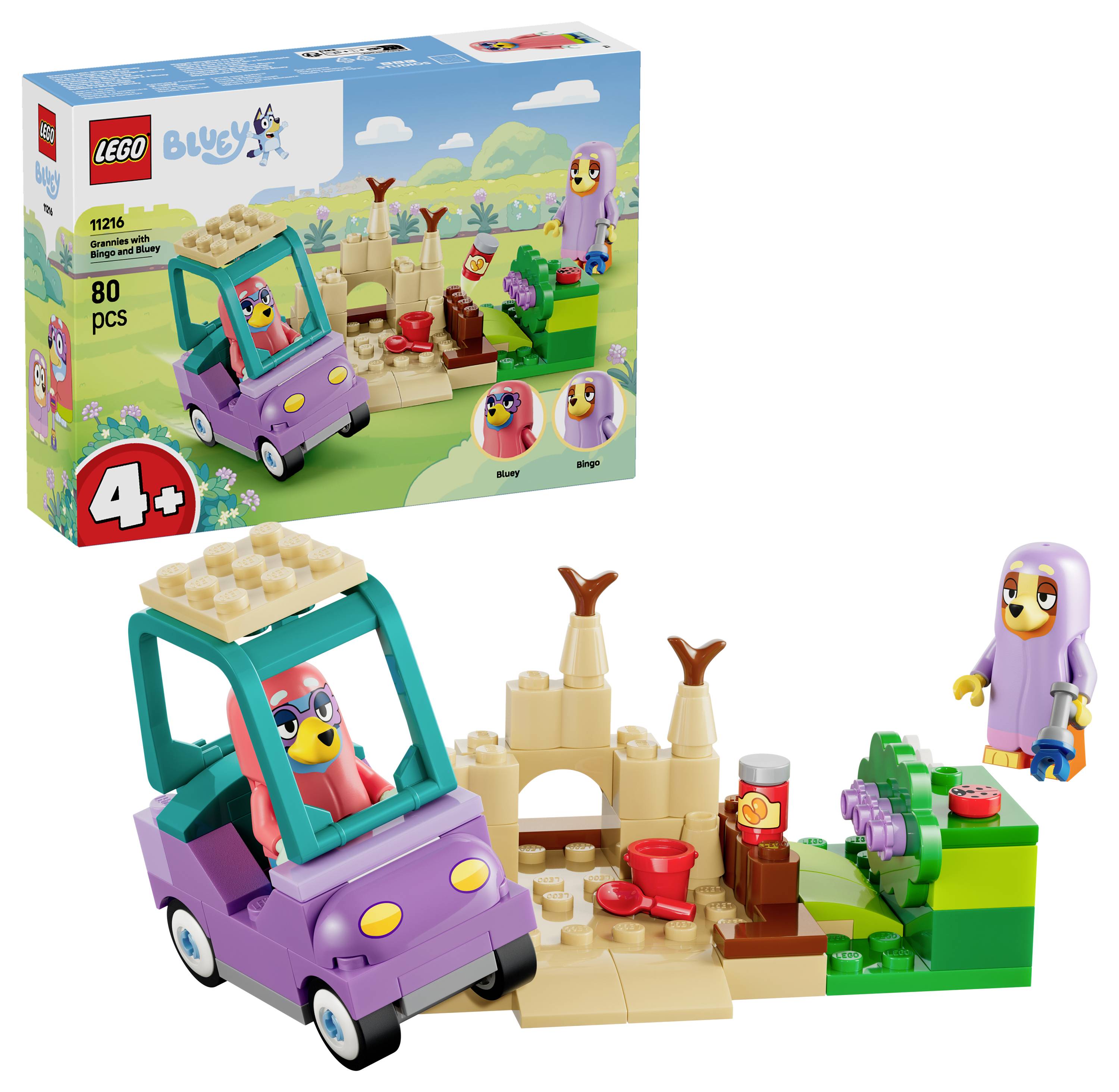 LEGO Duplo 'Prasátko Peppa' sada s krabicí a postavenou scénou zobrazující Peppu jedoucí v nachové autě kolem malého zámku z písku a figurky levandulového ptáka.