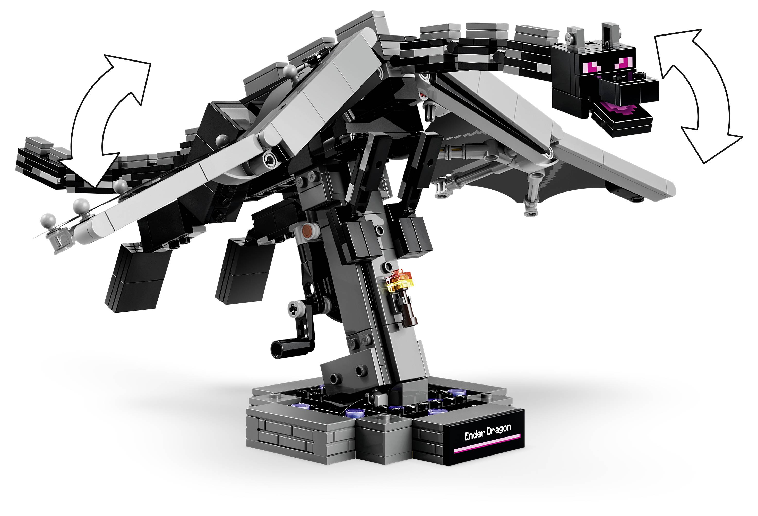 Lego-style černý a šedý model draka na podstavci, s pohyblivými křídly, ocasem a hlavou, zobrazen se šipkami naznačujícími artikulaci.