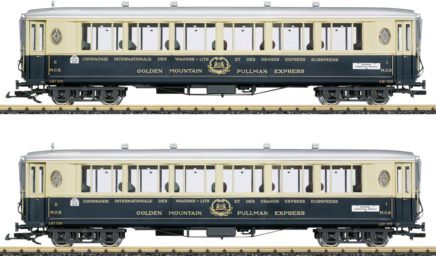 Dva boční pohledy na vintage model osobního železničního vozu 'Golden Mountain Pullman Express', zobrazené ve zlaté a tmavě zelené barvě na kolejích.