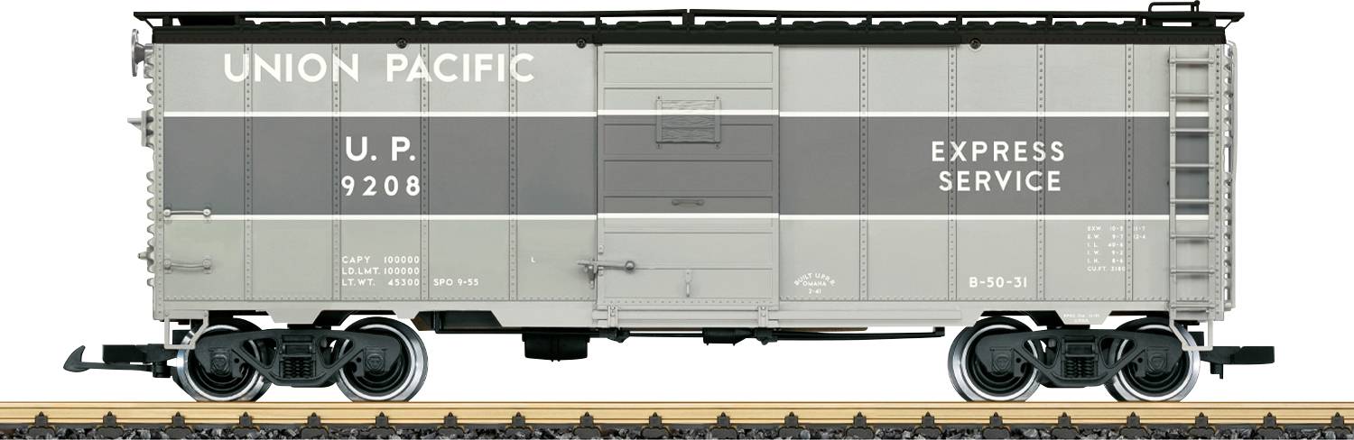 Boční pohled na nákladní vůz Union Pacific označený "U.P. 9208" a "EXPRESS SERVICE" na železničních kolejích.