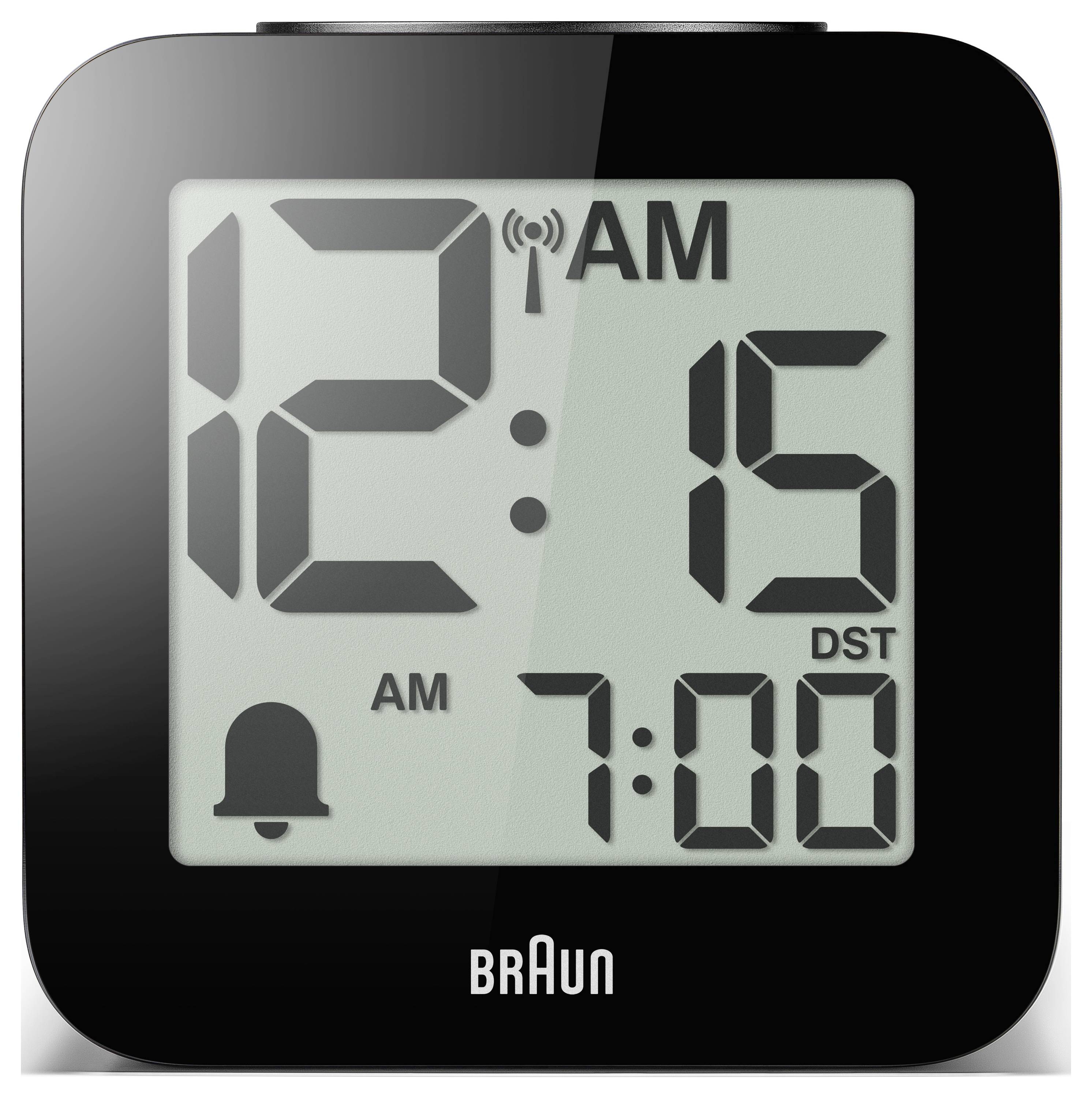 Digitální budík Braun Black zobrazující 12:15 AM s nastaveným alarmem na 7:00 a indikátorem letního času.