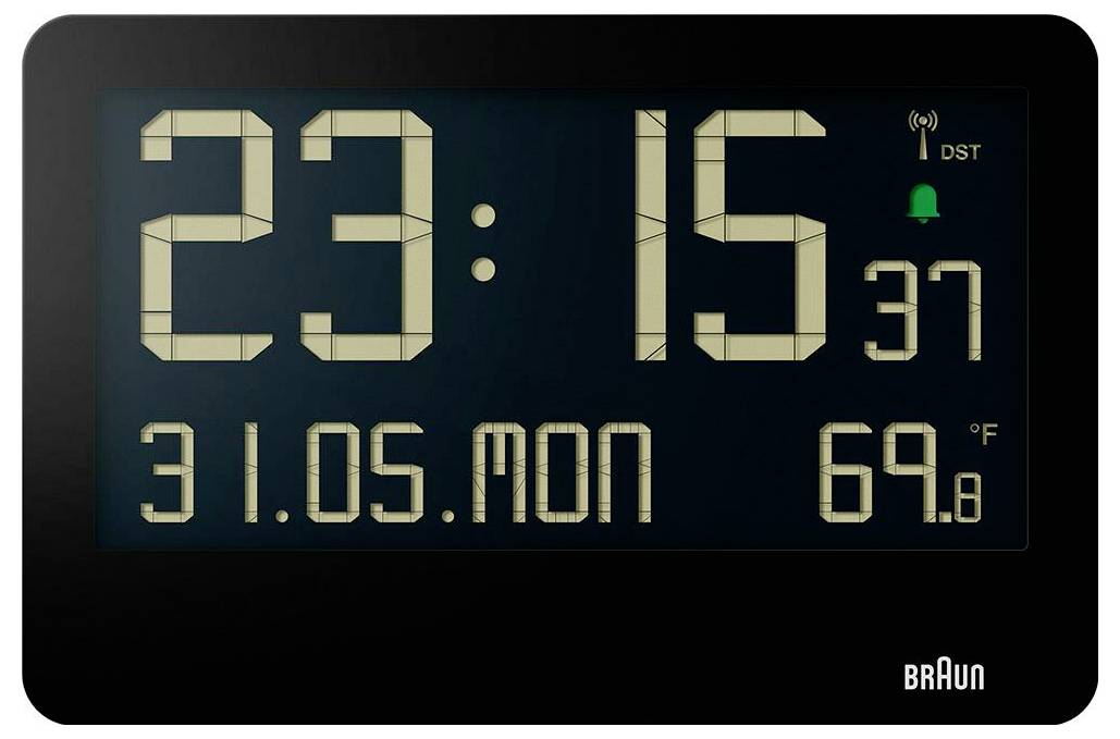 Digitální hodiny Braun zobrazující 23:15, pondělí 31.05, a 69,8°F, s indikátory letního času a budíku.