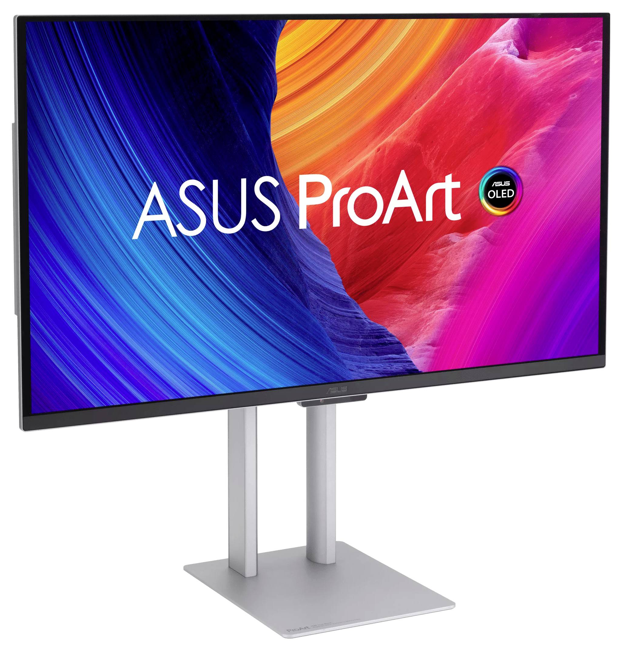 ASUS ProArt OLED monitor s barevným abstraktním zobrazením na stříbrném stojanu a podstavci, zobrazený v úhlu pohledu.