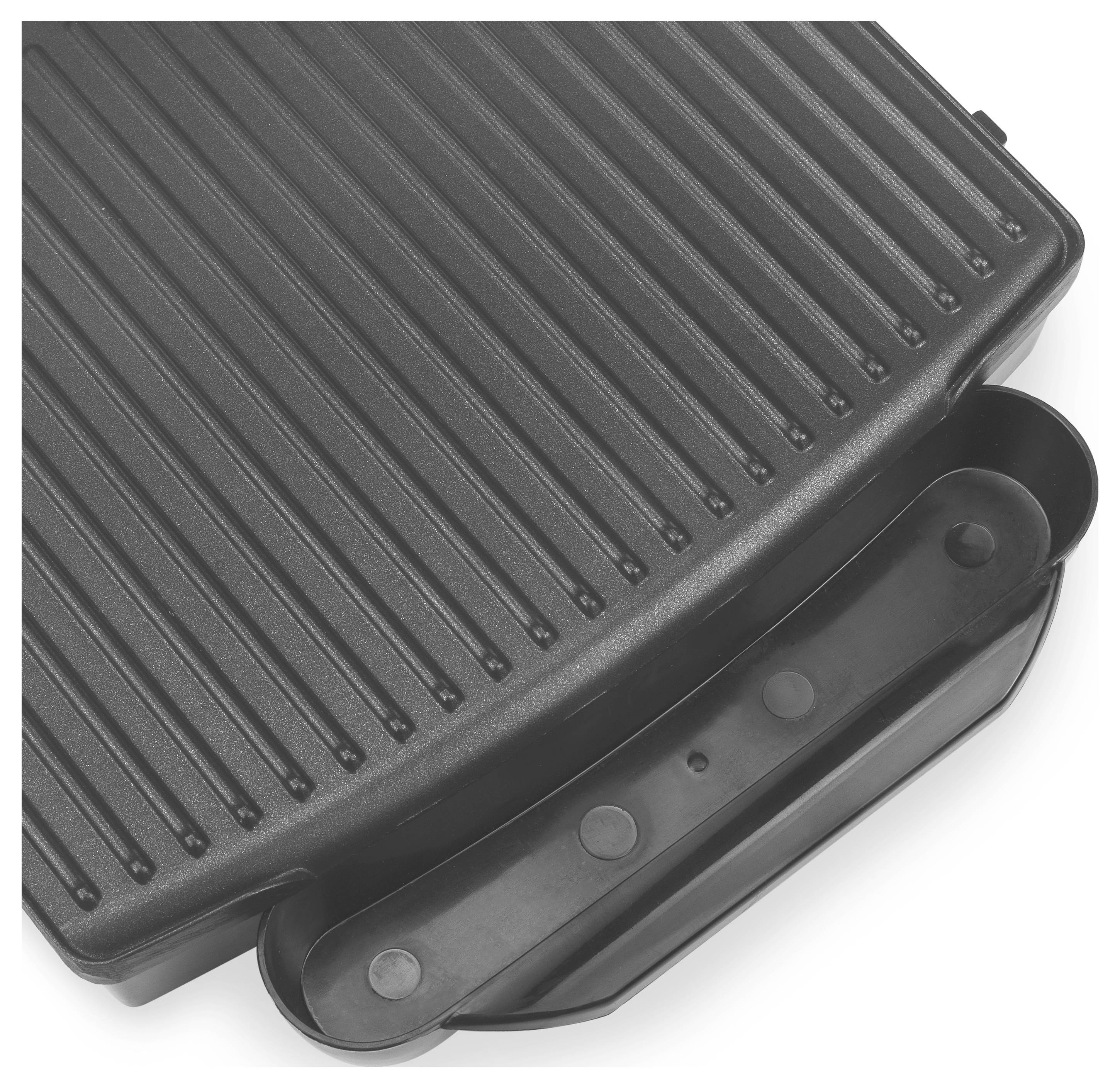 Detailní pohled na černý žebrovaný elektrický gril nebo panini lis s závěsným madlem na bílém pozadí.