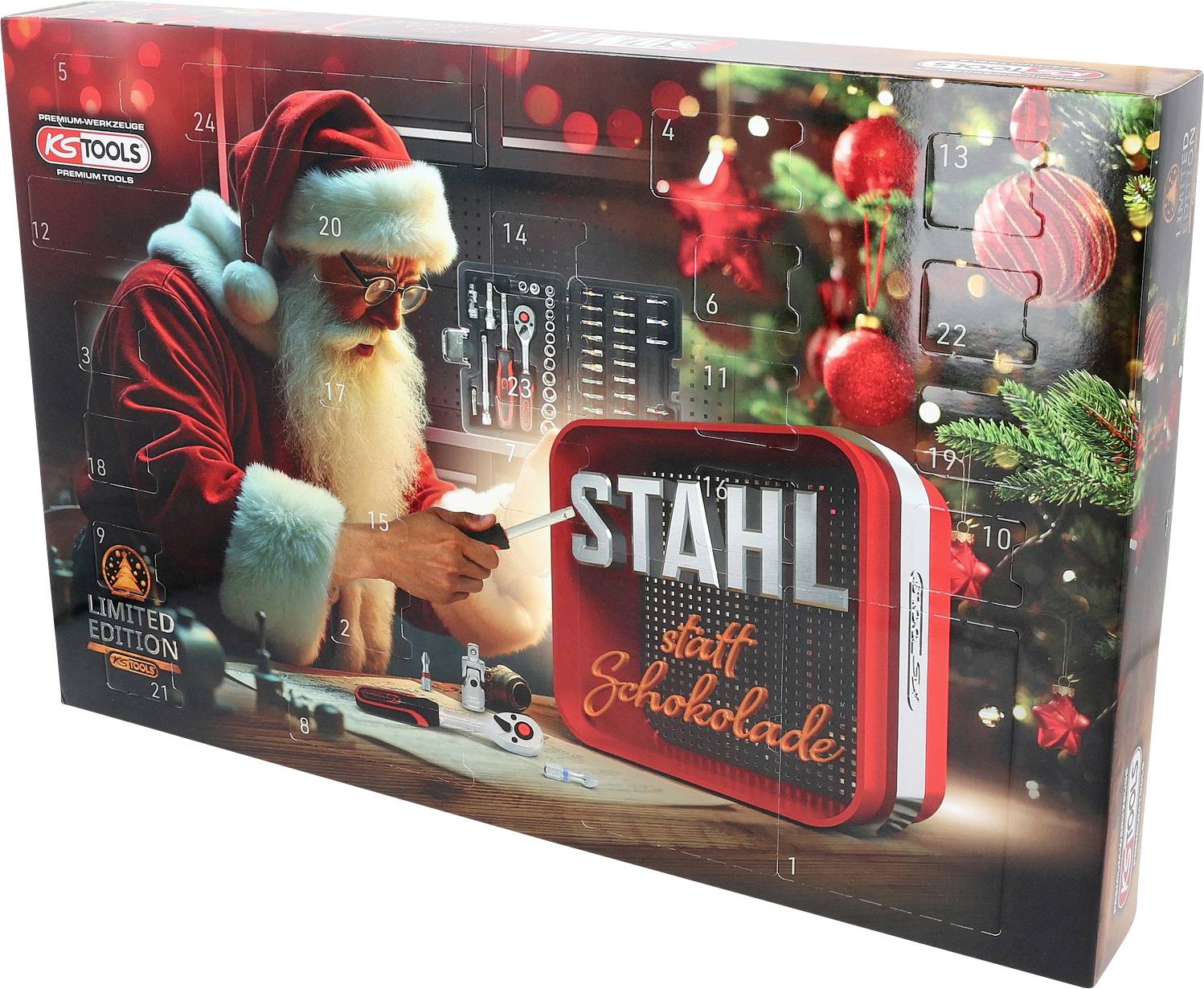 Vánoční edice KSTools "limitovaná edice" adventního kalendáře s krabicí zobrazující Santu pracujícího u pracovního stolu vedle červeného nápisu 'STAHL' a 'staff Schokolade'.