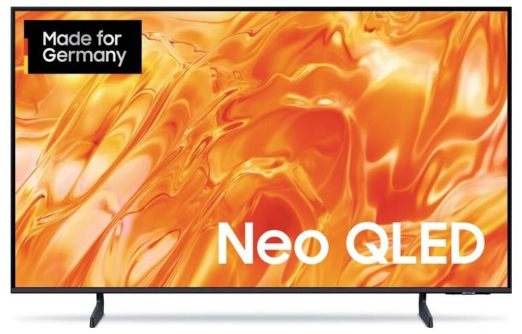 Televizor Samsung Neo QLED s oranžovým abstraktním displejem a štítkem "Vyrobeno pro Německo" v levém horním rohu.