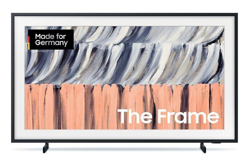 Plochá TV obrazovka s abstraktními tahy štětce a textem "Made for Germany" a "The Frame".