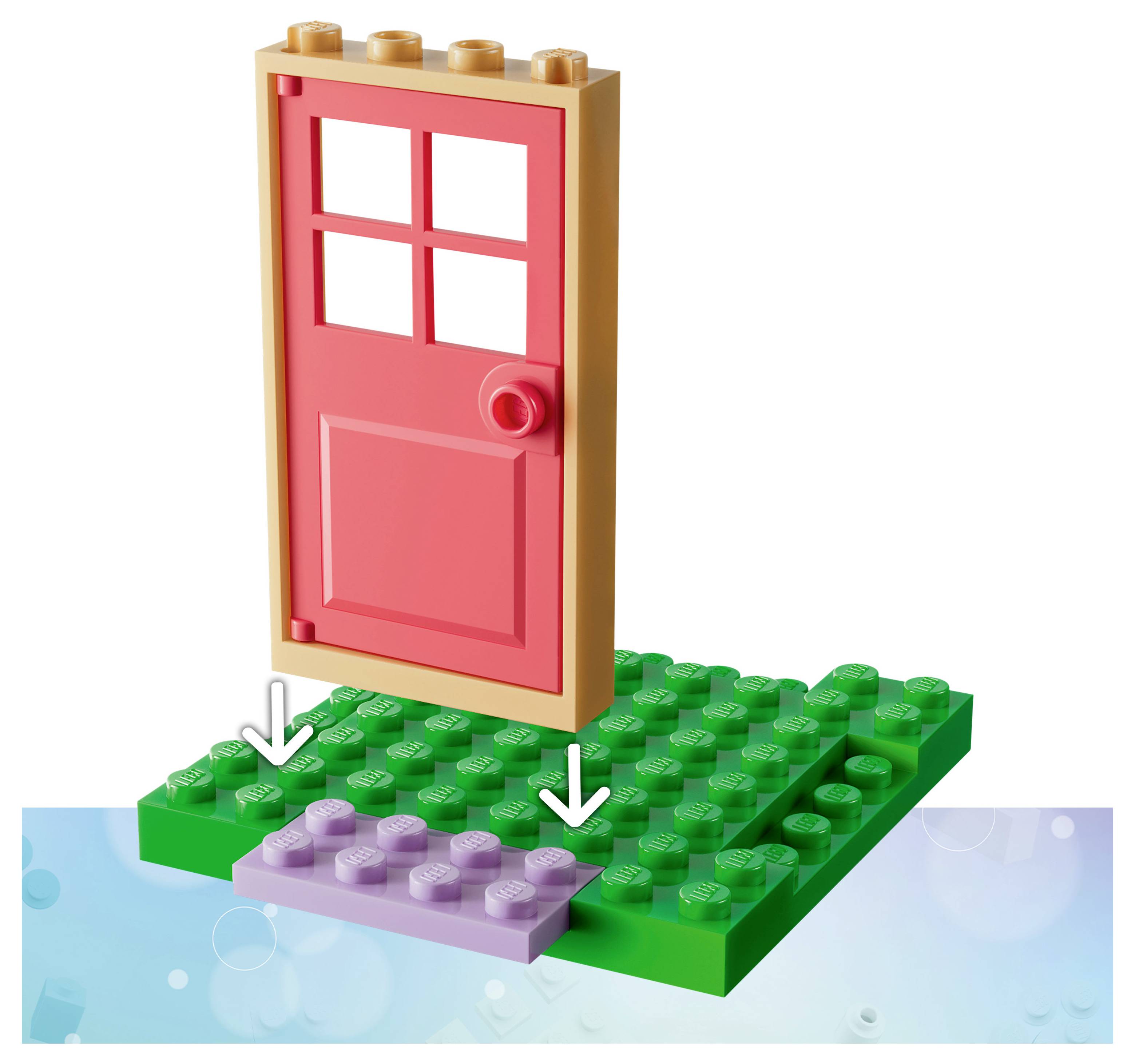 Červené dveře namontované na zelené podstavě ve stylu LEGO s menší fialovou deskou a šipkami směřujícími dolů indikujícími umístění nebo montáž.