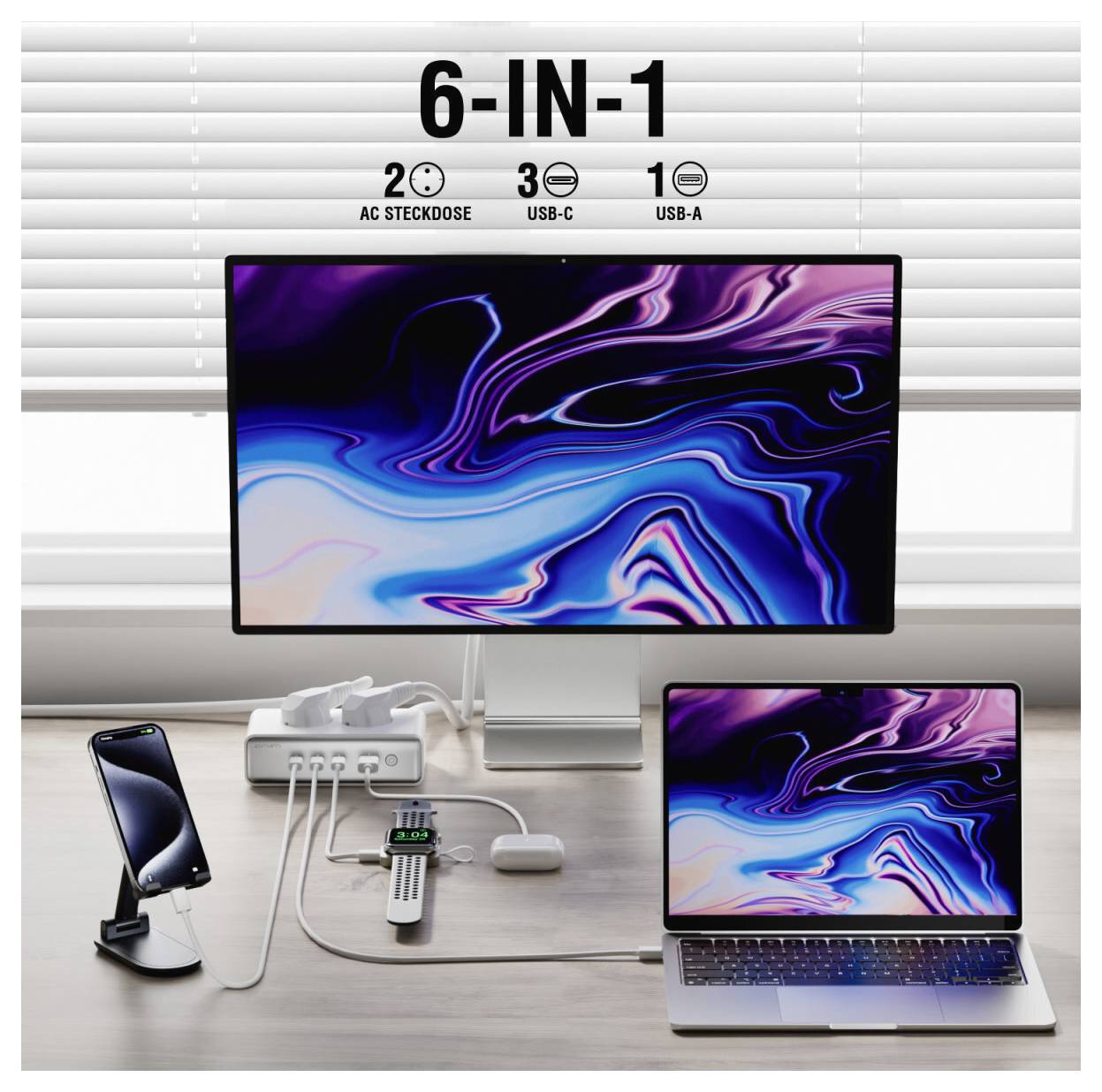 Propagační obrázek nabíjecího standu 6v1, který napájí desktopový monitor, notebook a telefon, s popisky pro zásuvku AC, porty USB-C a USB-A.