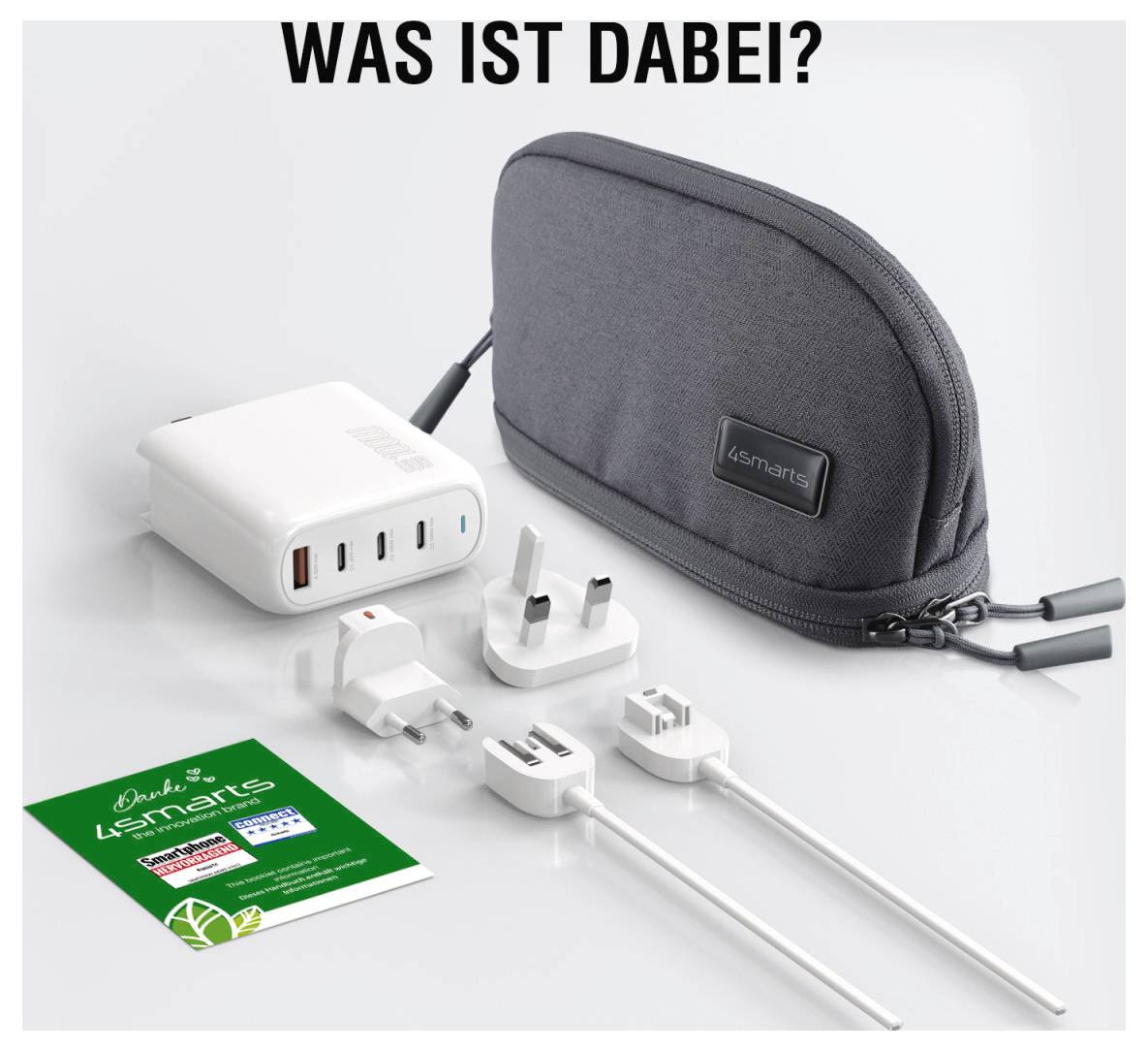 Sada produktu zobrazující šedou tašku 4smarts, bílou multi-portovou USB nabíječku, několik mezinárodních adaptérů zástrček, dva nabíjecí kabely a zelenou instrukční kartu pod textem 'CO JE SOUČÁSTÍ BALENÍ?'
