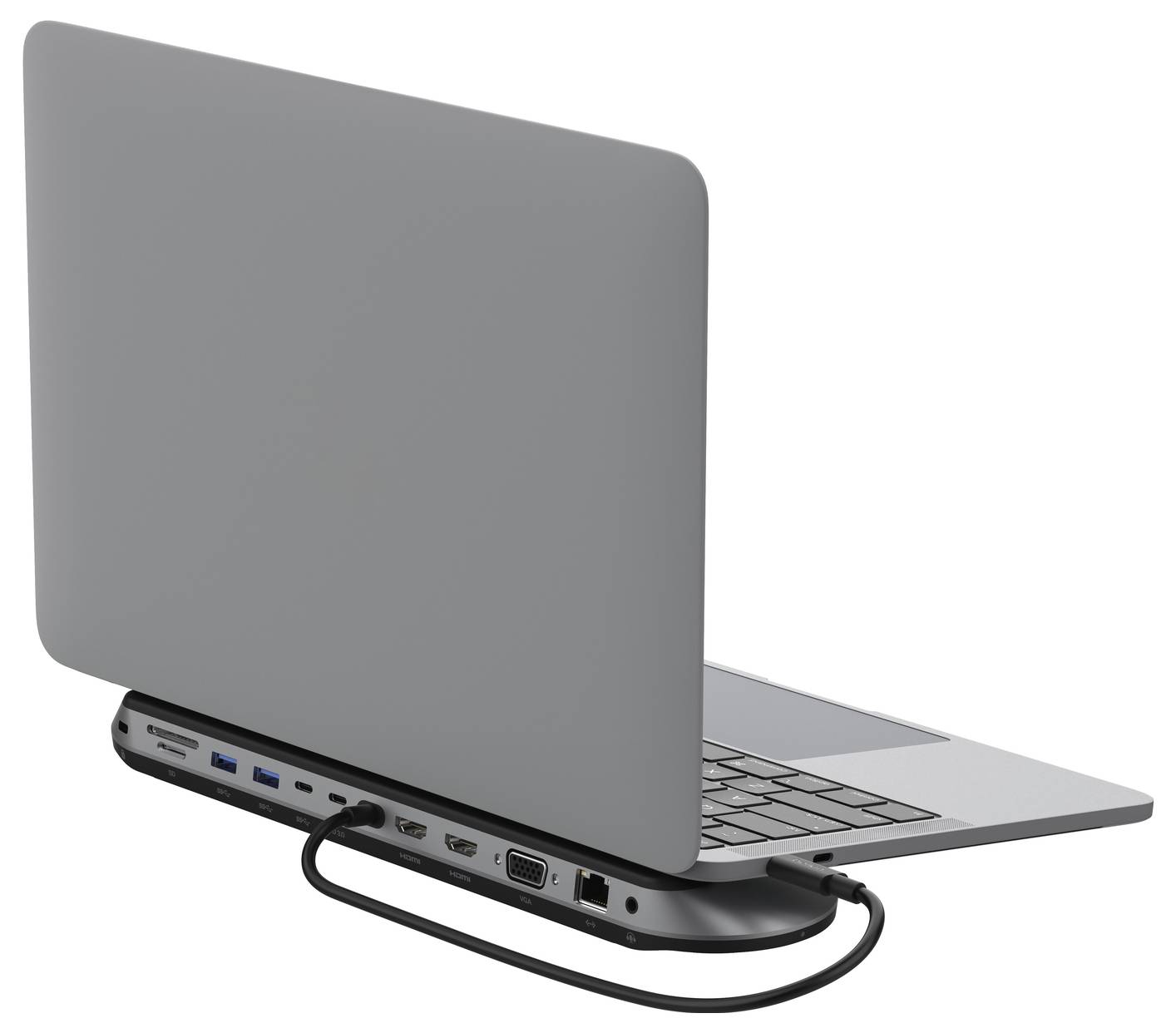 Přenosný počítač se zavřeným víkem připojený k zadnímu dokovacímu zařízení/adaptéru, na kterém je vidět více portů a připojený kabel.