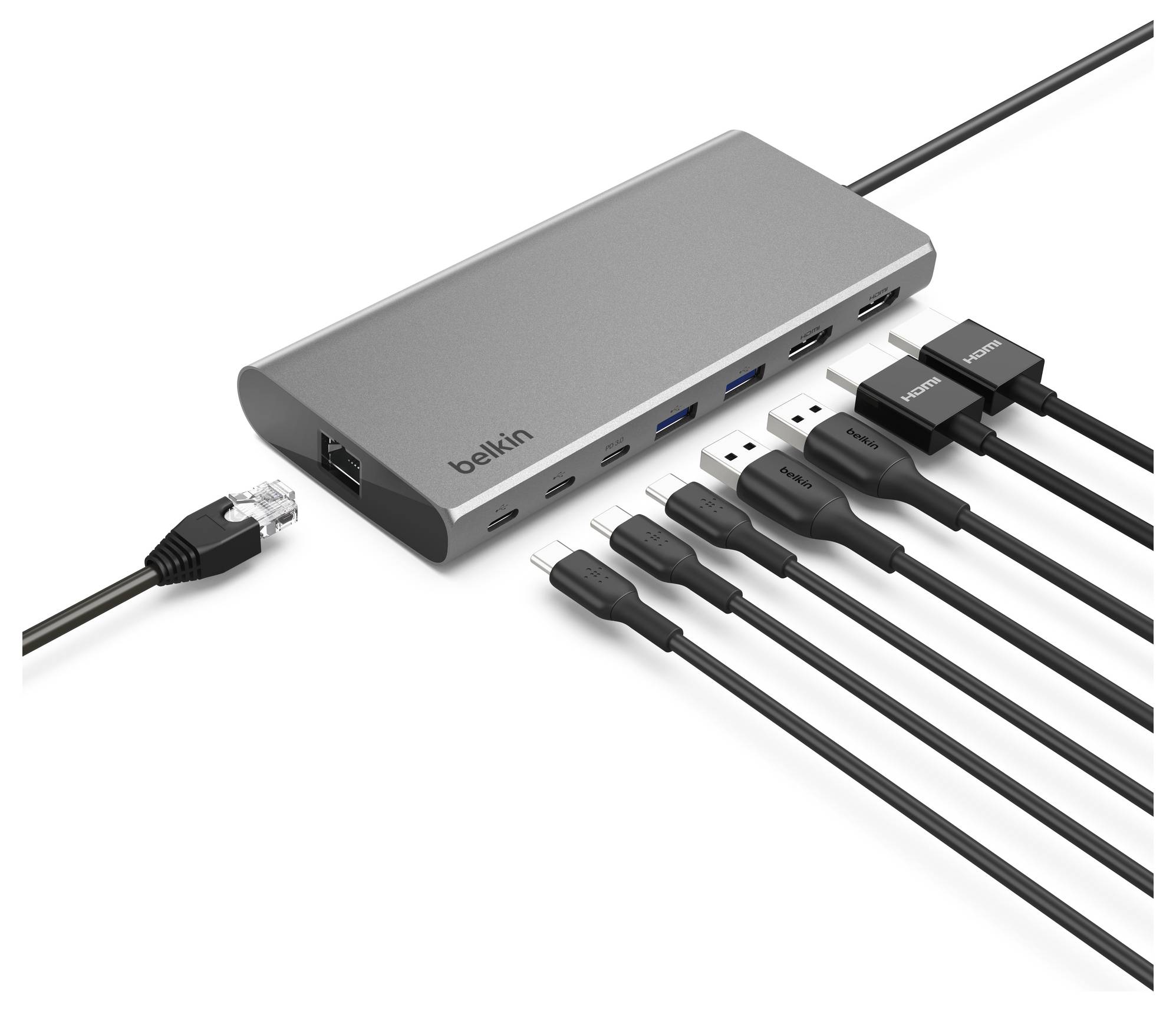 Belkin USB-C rozbočovač s více připojenými kabely, zobrazující několik USB a HDMI portů pro rozšíření připojení notebooku.