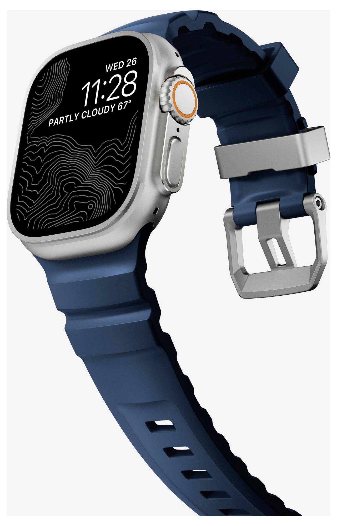 Apple Watch Ultra s modrým páskem, zobrazující ciferník s textem „ST 26 11:28" a „ČÁSTEČNĚ ZATAŽENO 67°"