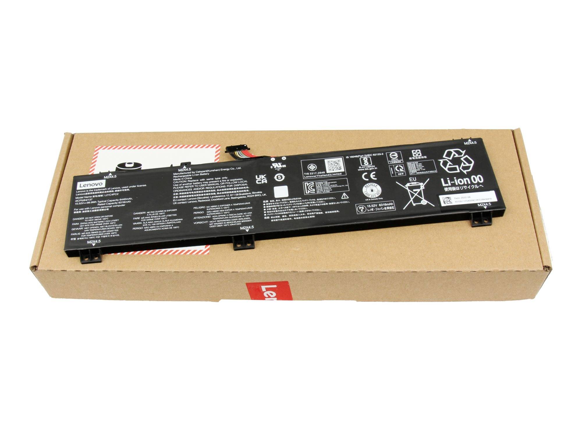 Černá lithium-iontová baterie do notebooku Lenovo v kartonové krabici, zobrazená na svém obalu se symboly varování a recyklace.