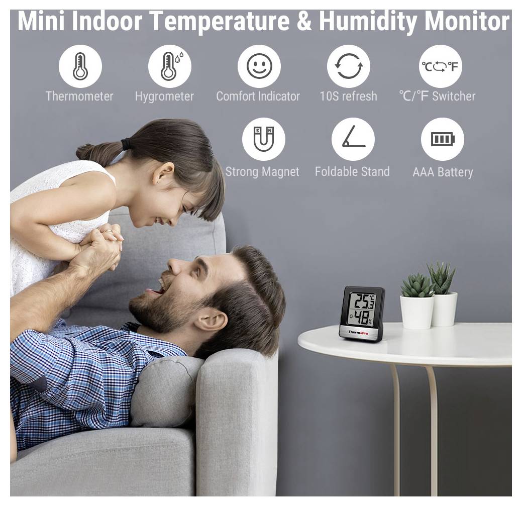 Propagační obrázek miniaturního vnitřního monitoru teploty a vlhkosti s ikonami popisujícími teploměr, vlhkoměr, indikátor komfortu, aktualizaci každých 10 sekund, přepínač °C/°F, magnet, skládací stojan a baterii AAA.
